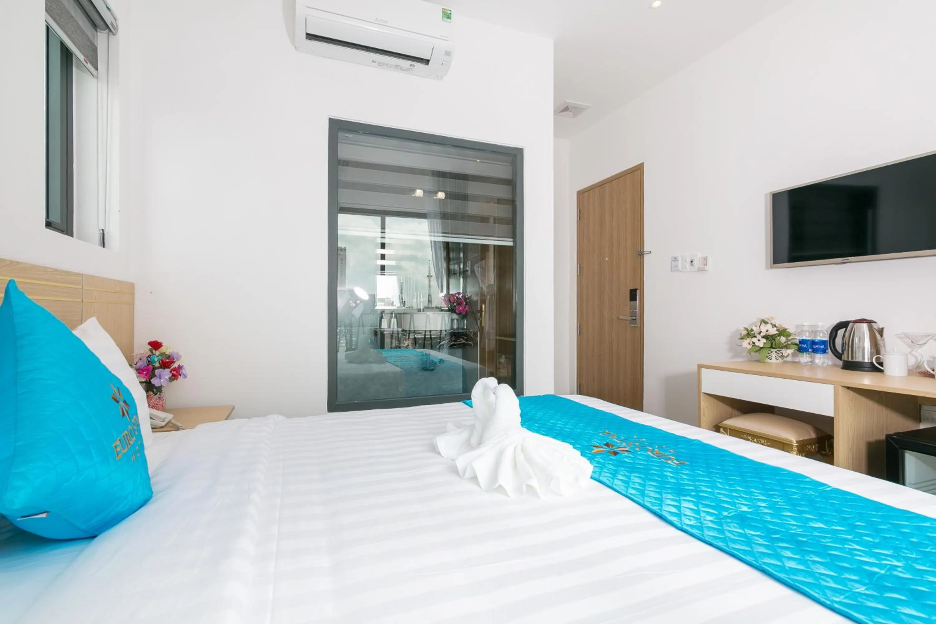 Bed in Euro Star Riverside Hotel