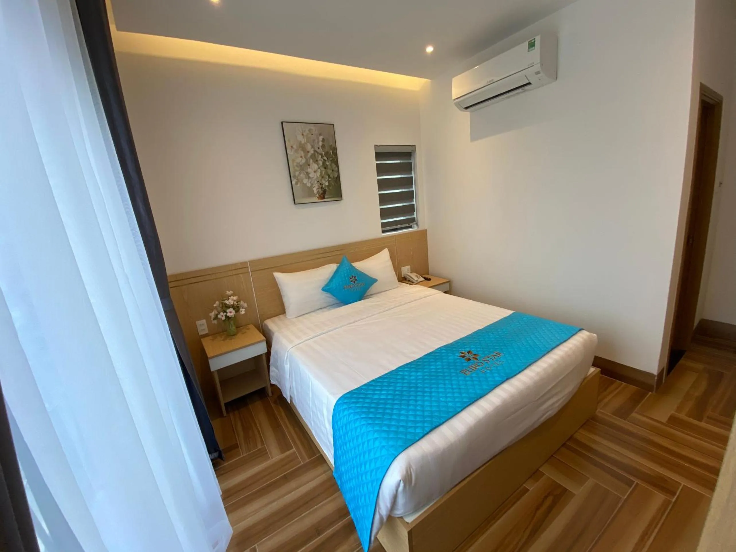 Bed in Euro Star Riverside Hotel