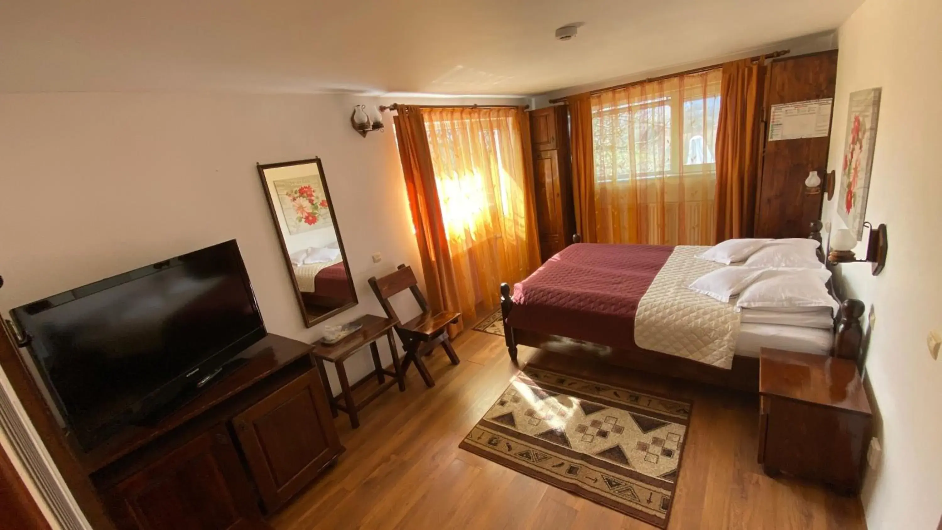 Deluxe Double Room with Balcony in Pensiunea Cerbul Carpatin Deluxe Double Room with Balcony in Pensiunea Cerbul Carpatin