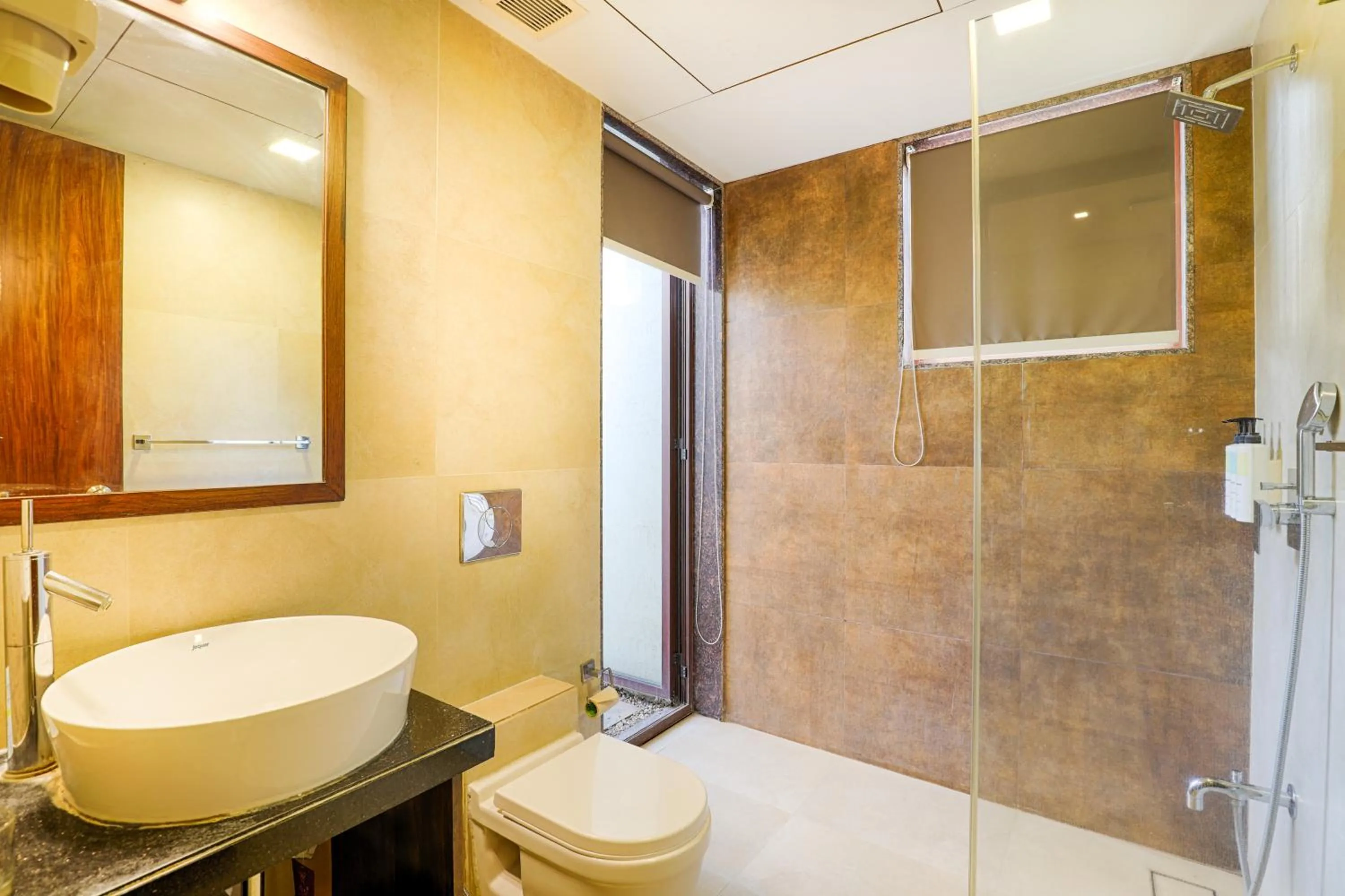 Shower in Tropicana Resort & Spa Alibaug, A Club Mahindra Associate
