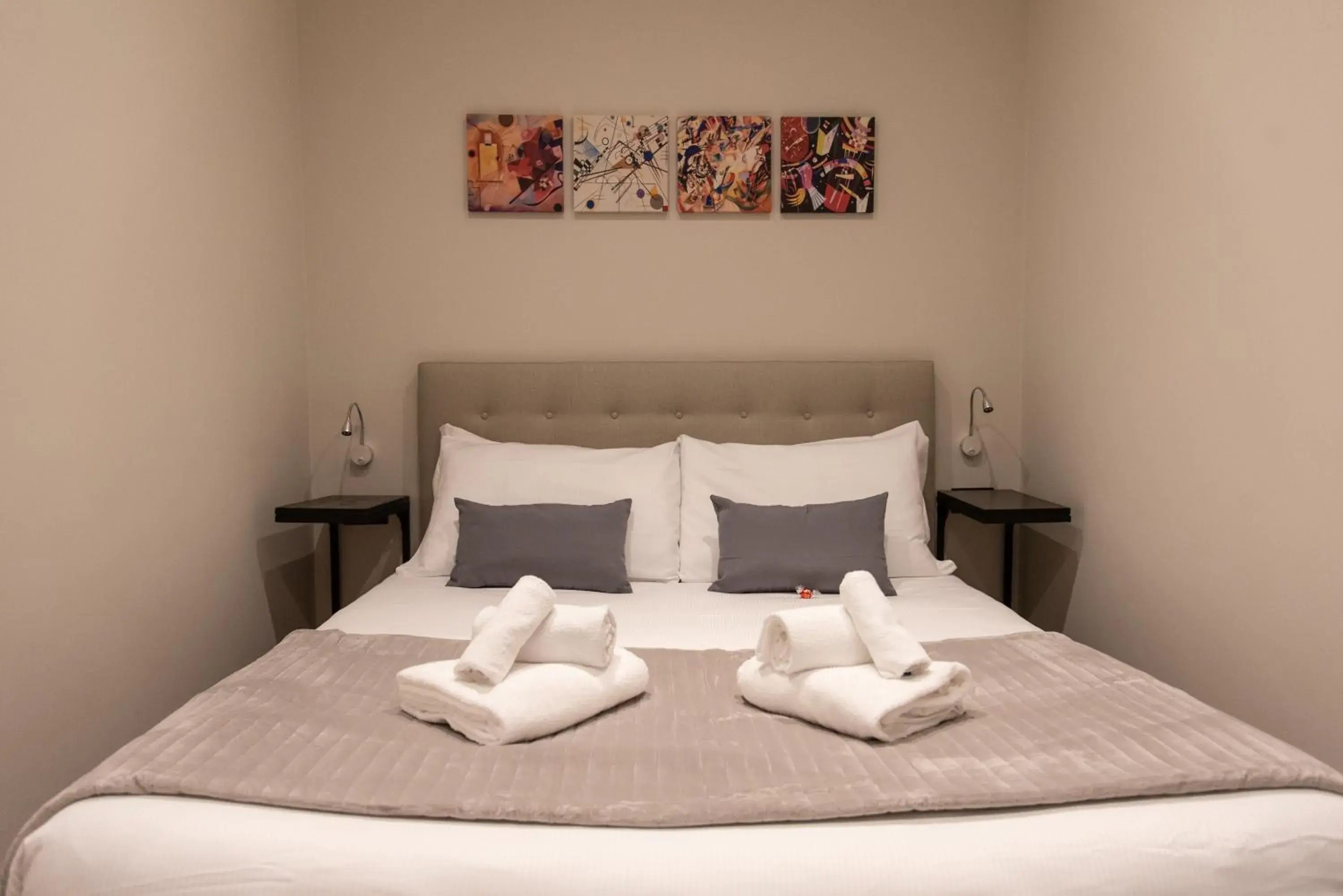 Bed in XXIV Domus Luxury Suites Bed in XXIV Domus Luxury Suites