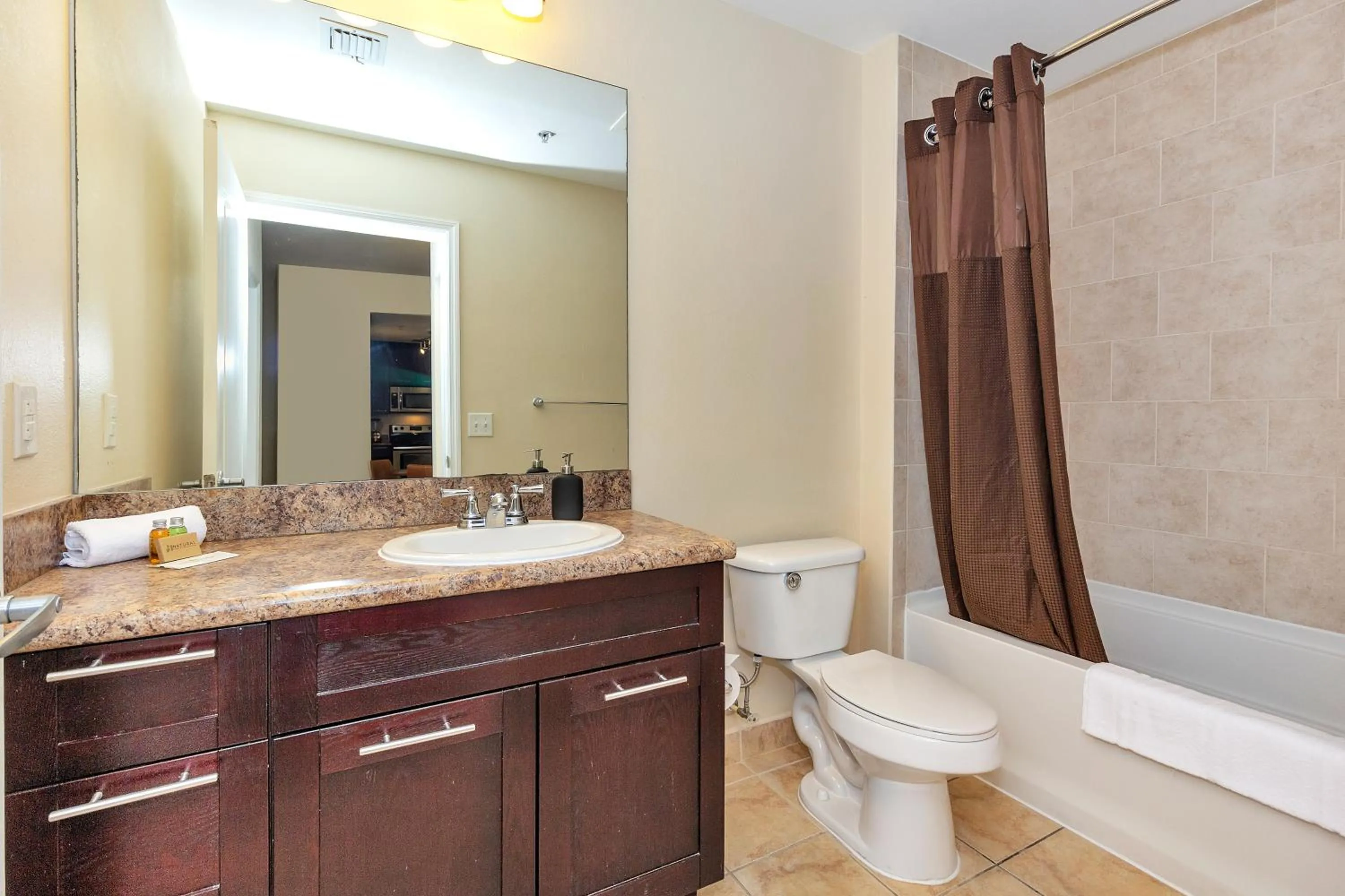 Bathroom in Dharma Home Suites South Miami at Red Road Commons
