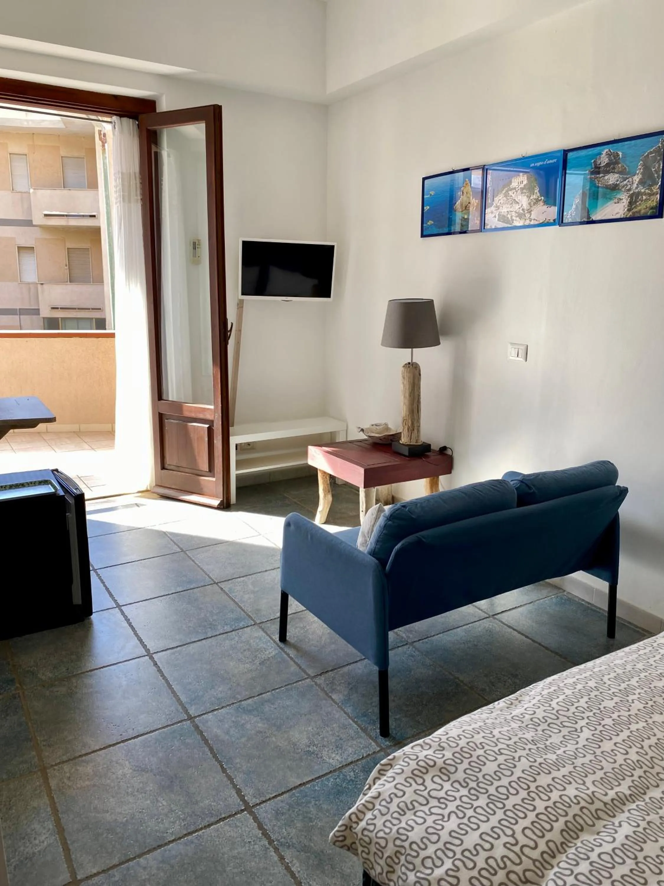 Seating area, Bed in Arcobaleno Tropea centro