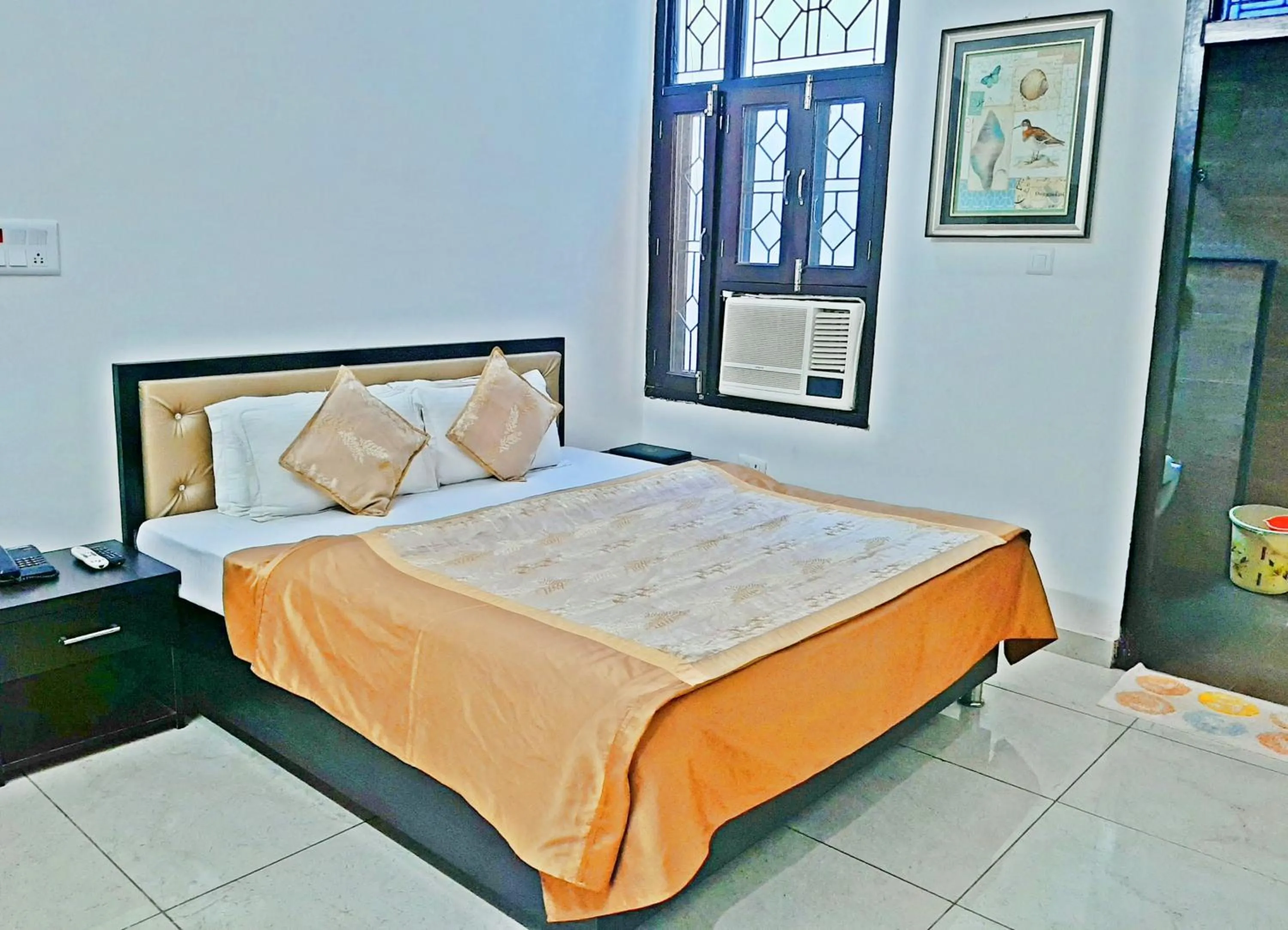 Bed in Bindiram Express by ShriGo Hotels