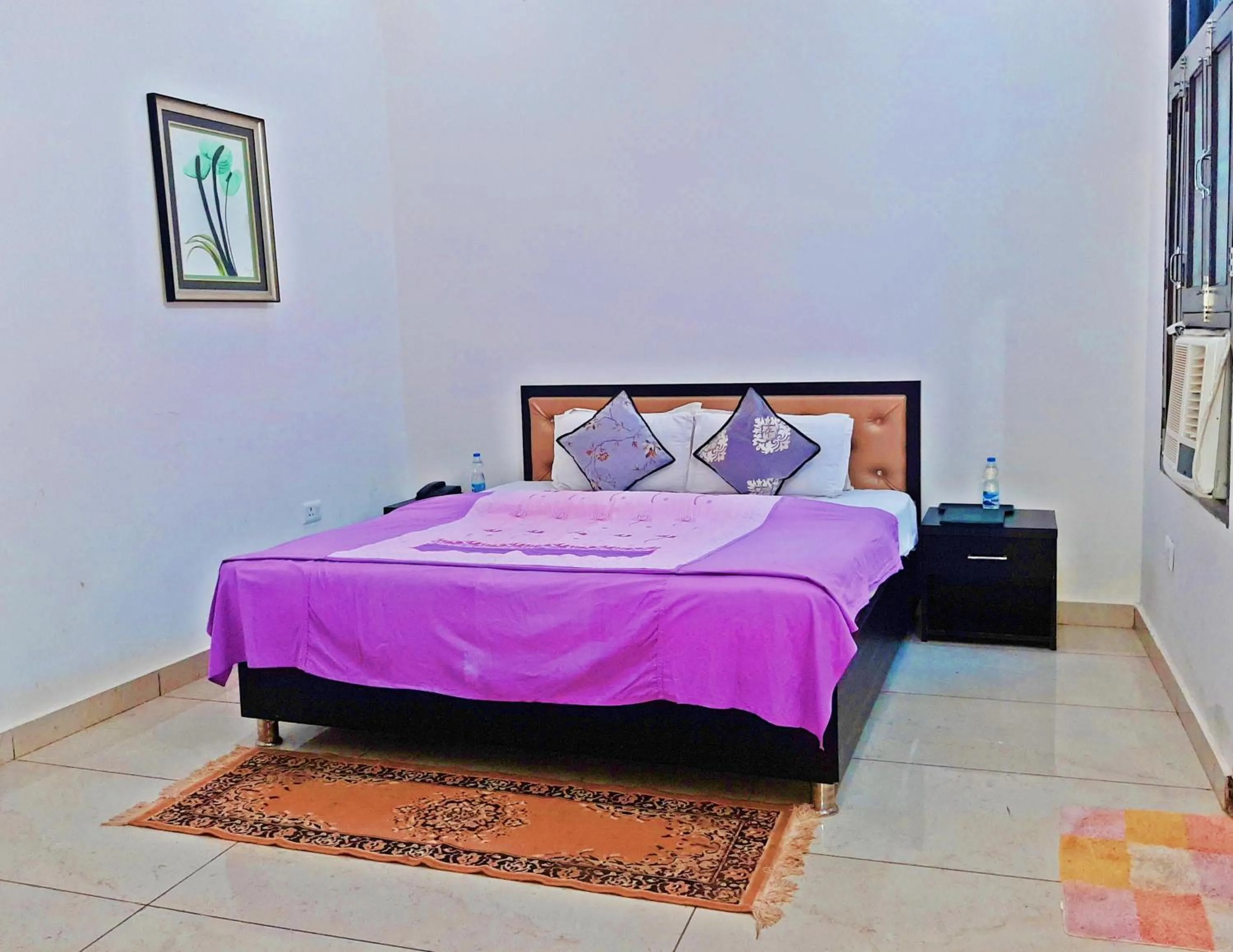 Bed in Bindiram Express by ShriGo Hotels