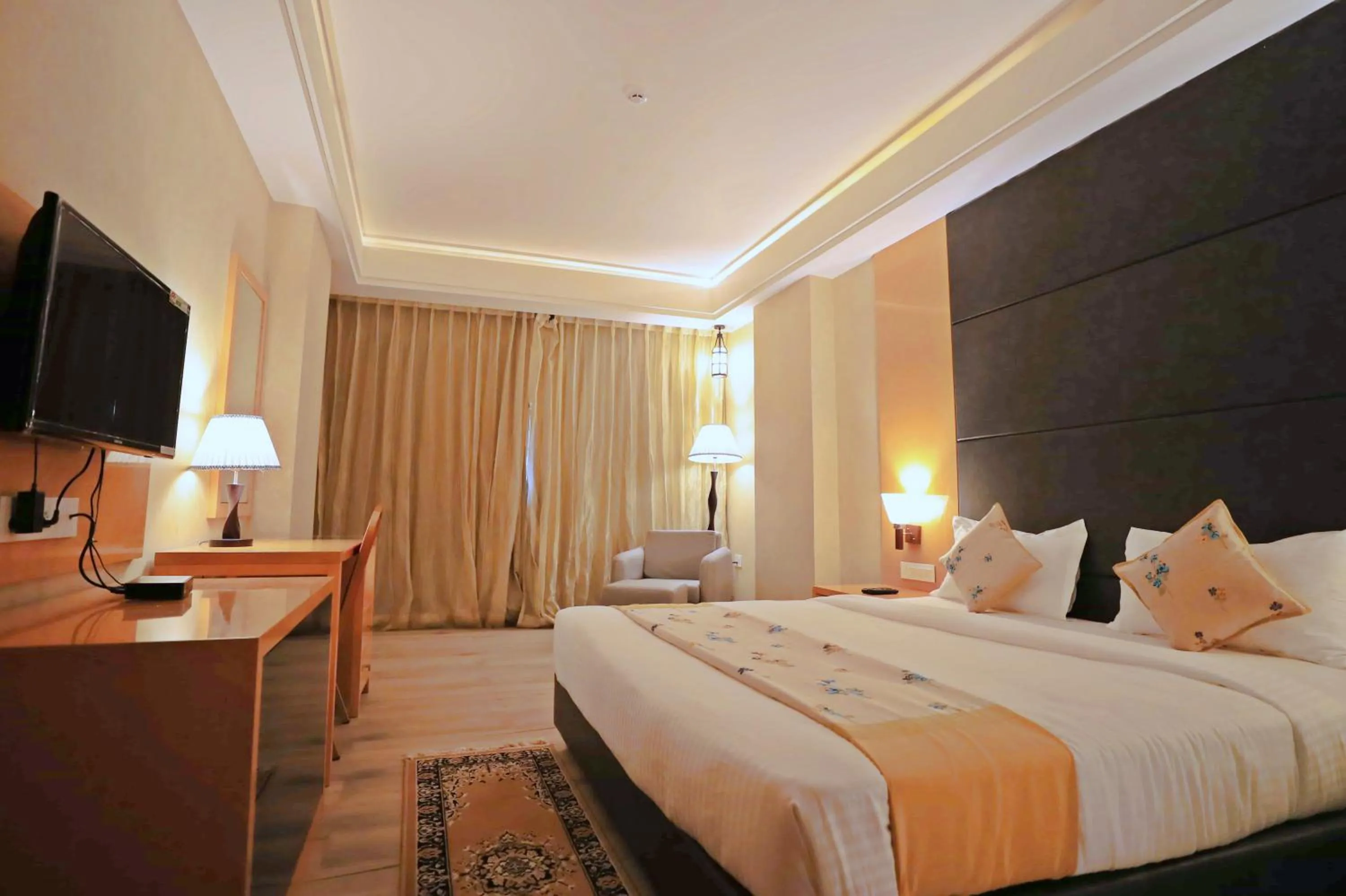 Bed in Bindiram Express by ShriGo Hotels