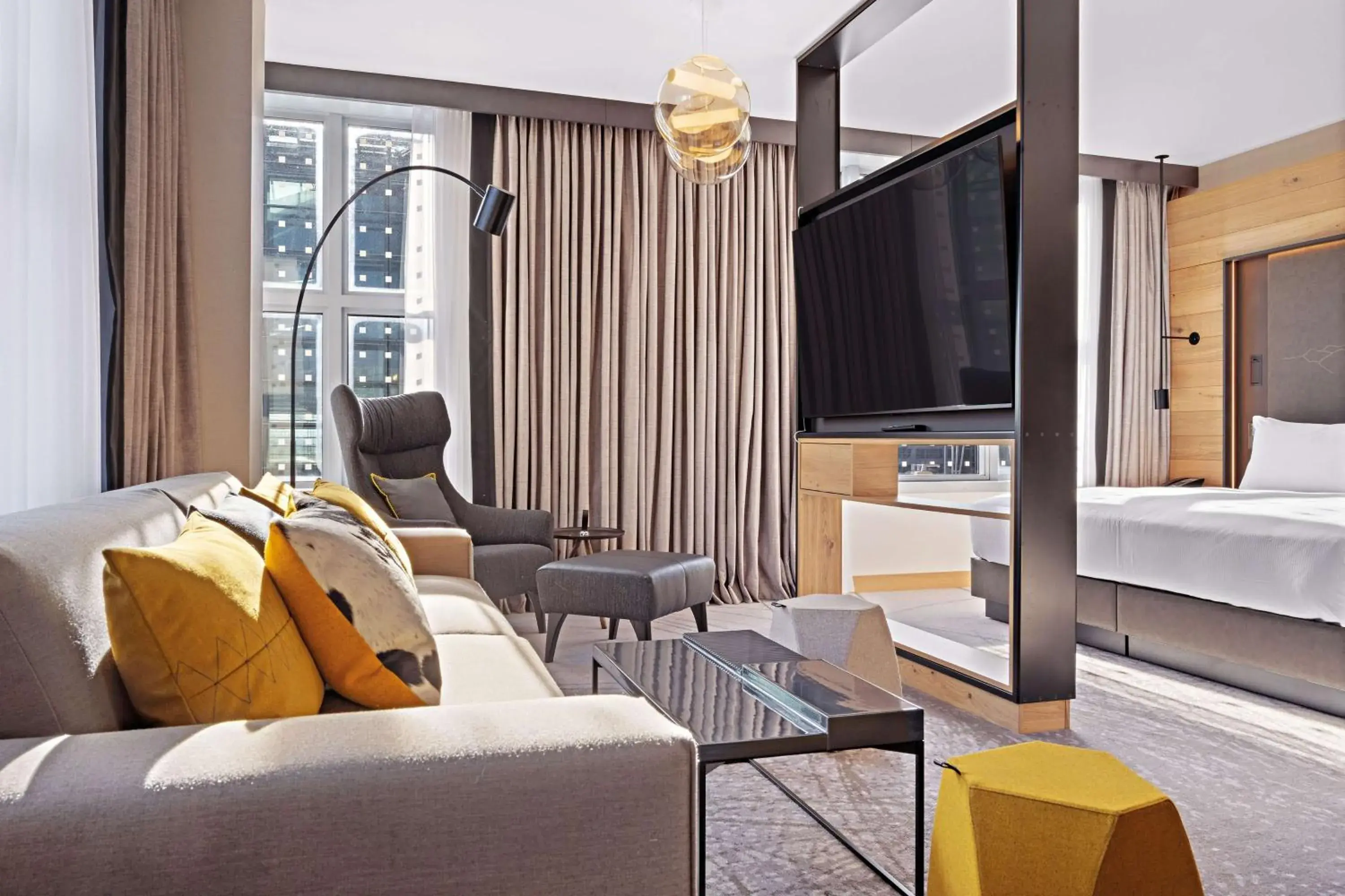 Living room, Bed in Hilton Munich Airport Living room, Bed in Hilton Munich Airport