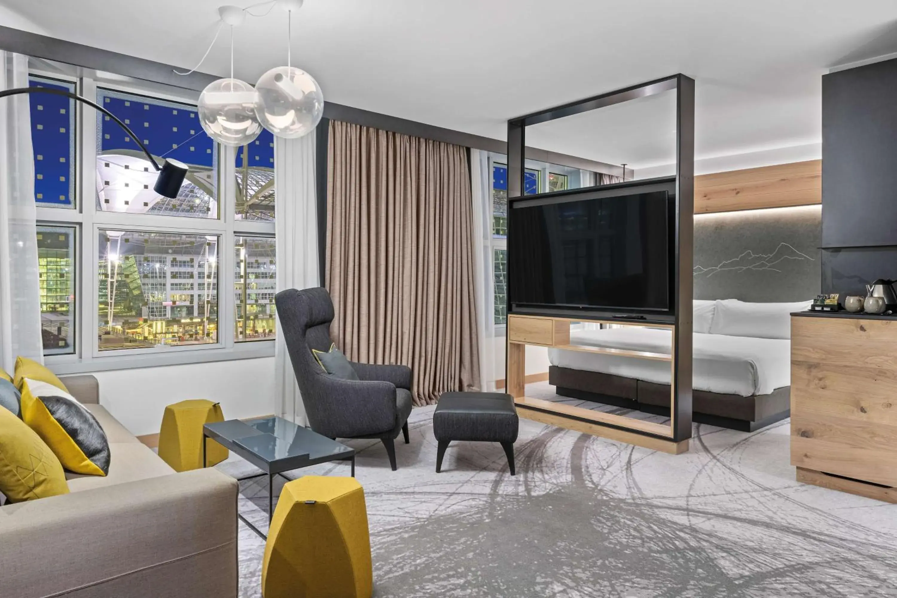 TV and multimedia, Bed in Hilton Munich Airport TV and multimedia, Bed in Hilton Munich Airport