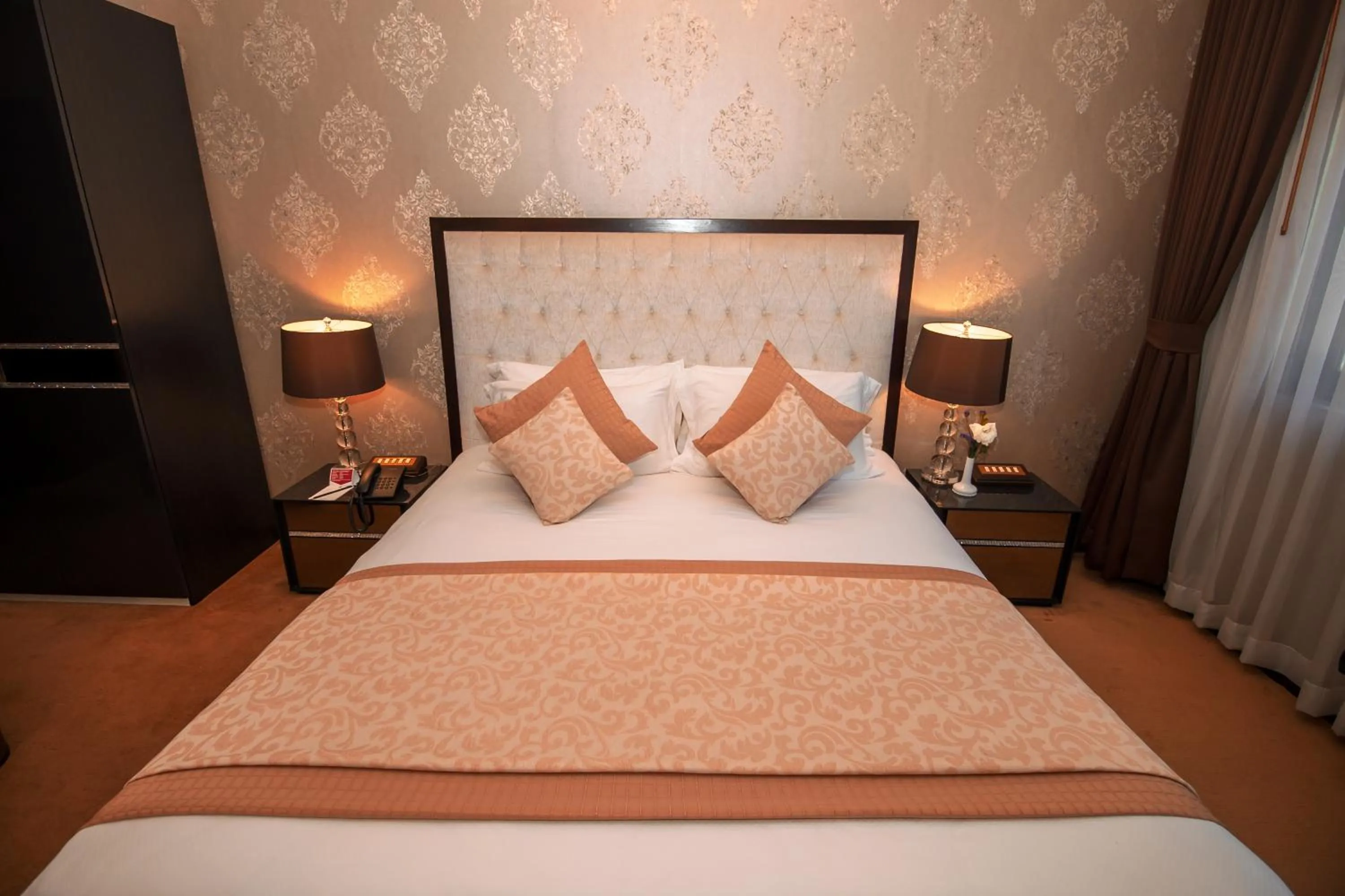 Bed in LAOTEL VIENTIANE