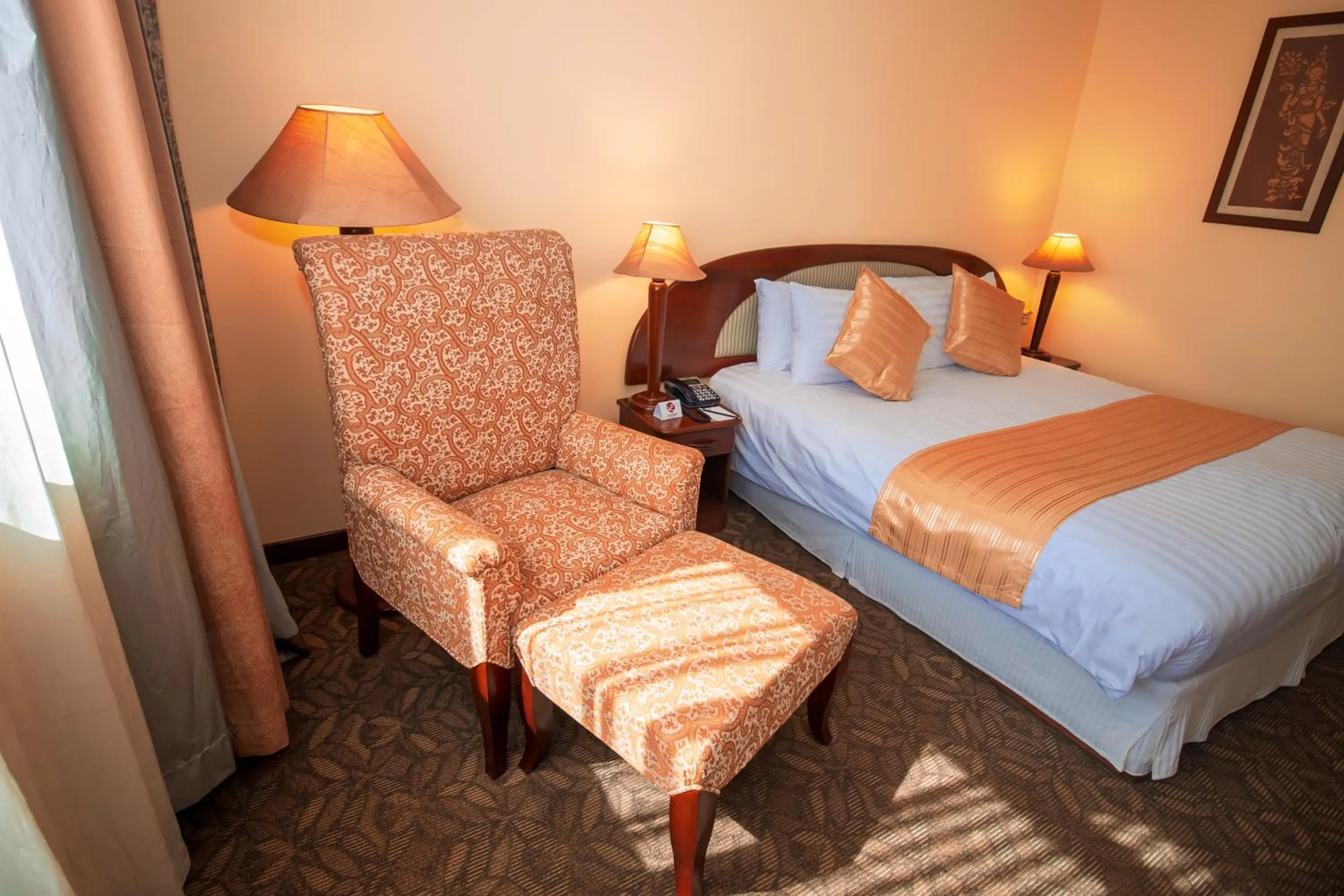 Bed in LAOTEL VIENTIANE