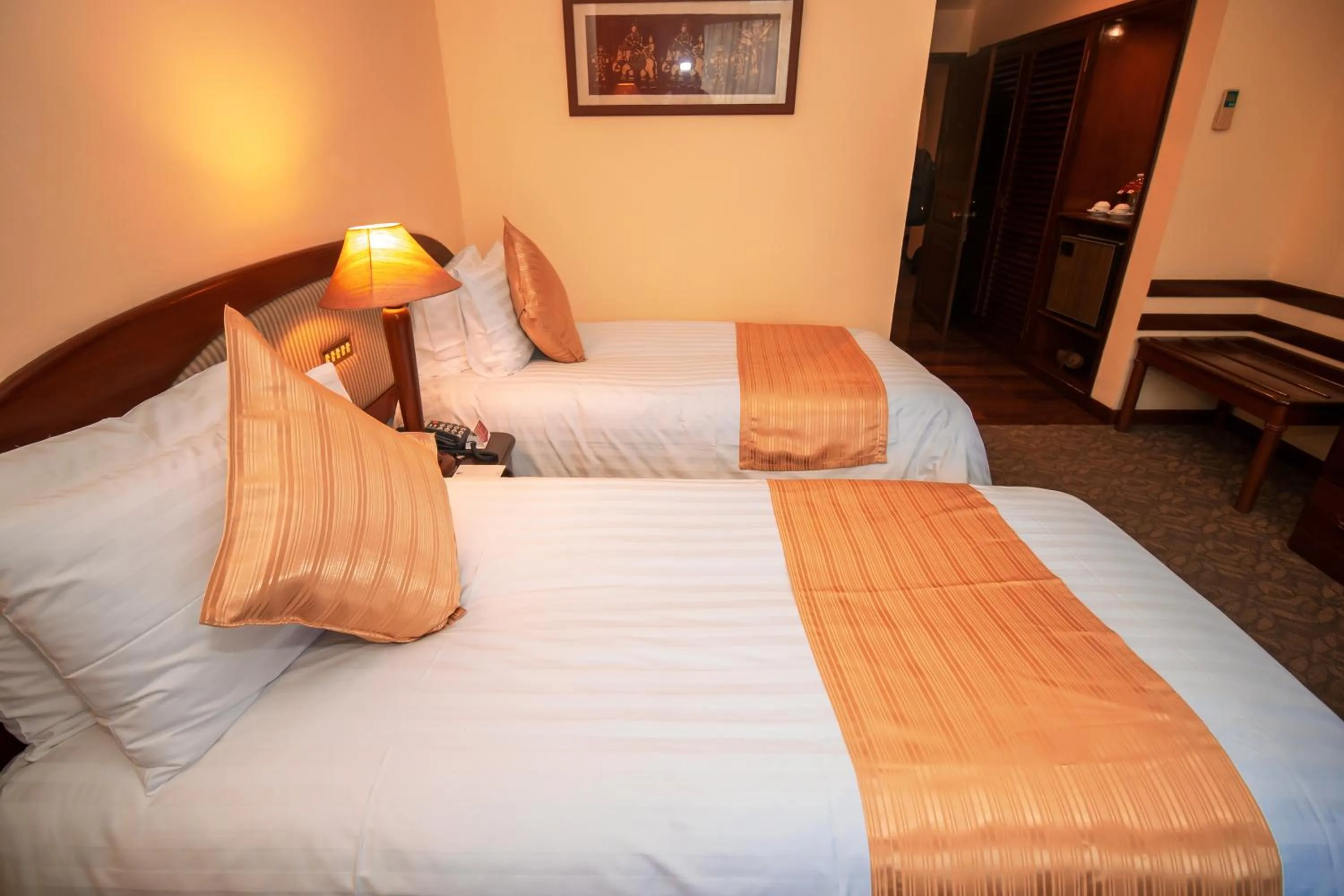 Bed in LAOTEL VIENTIANE