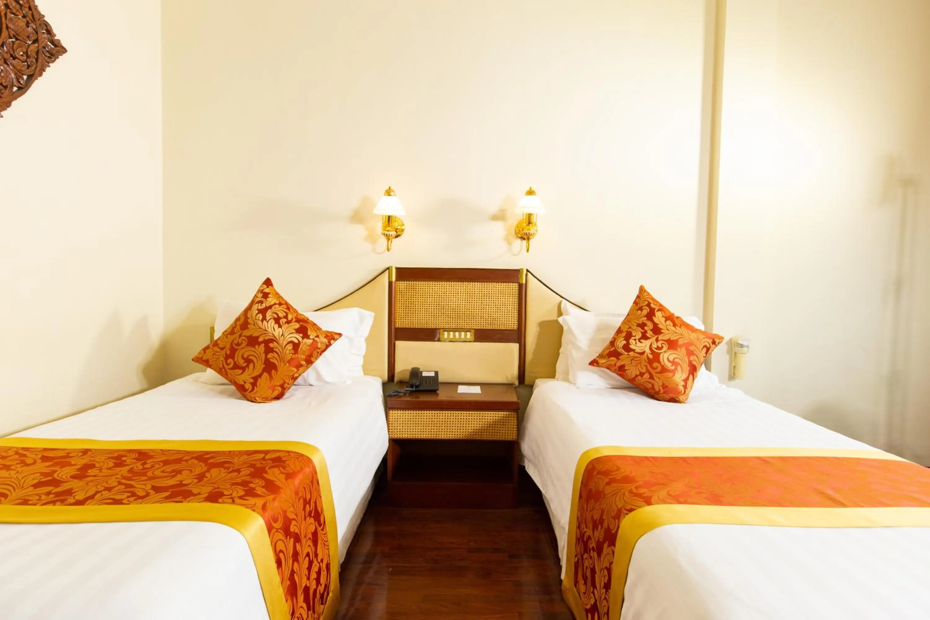 Bed in LAOTEL VIENTIANE