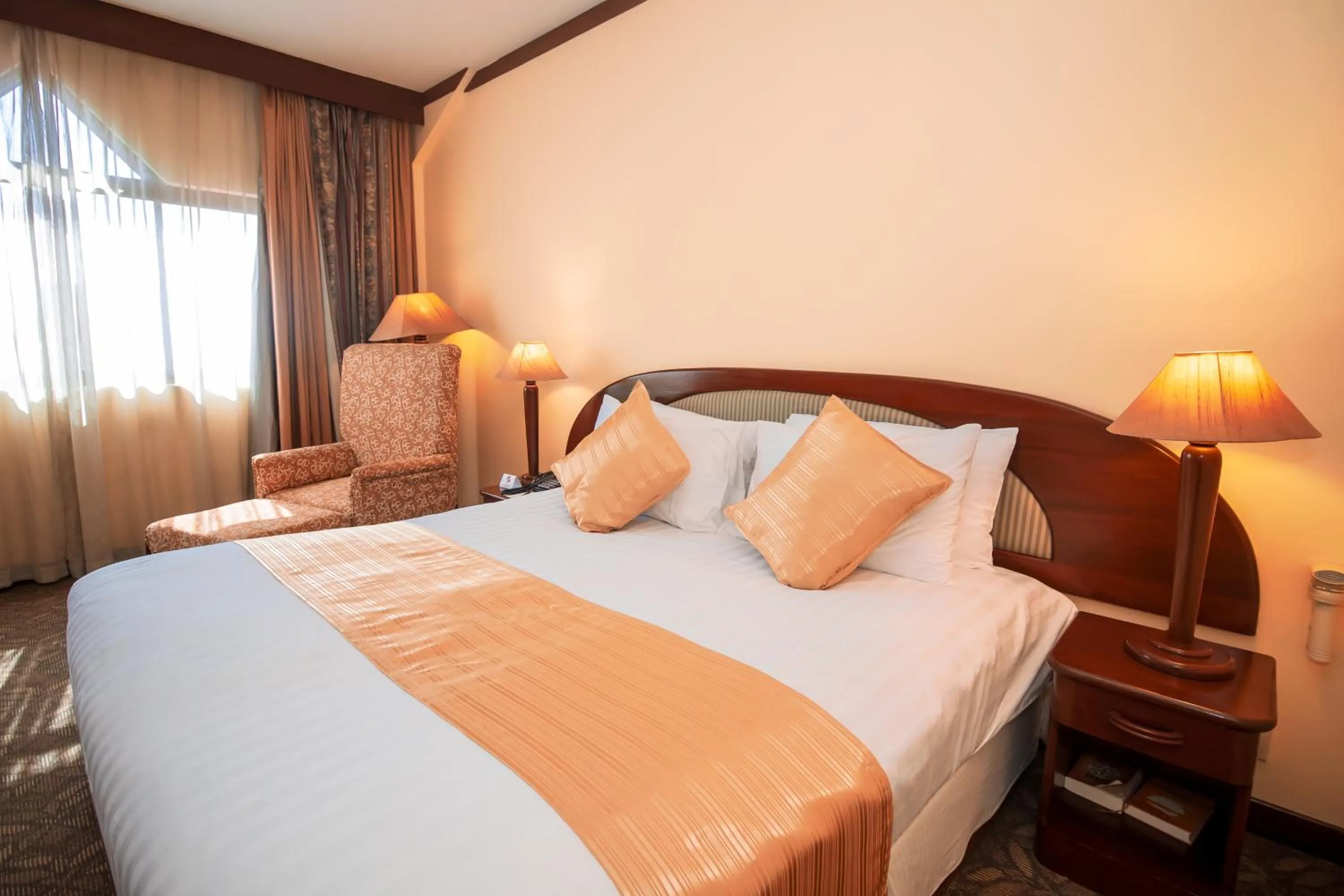 Bed in LAOTEL VIENTIANE