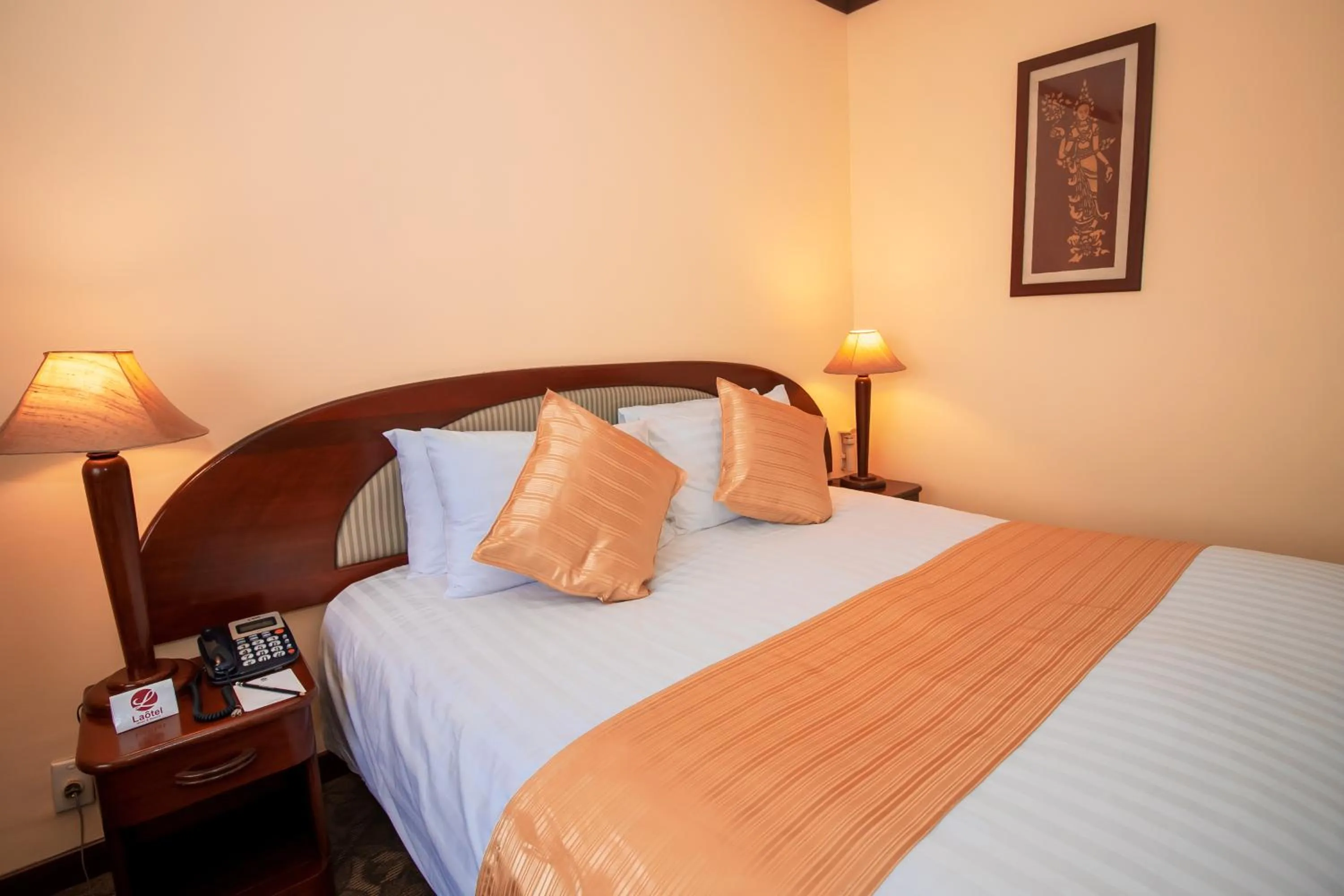 Bed in LAOTEL VIENTIANE