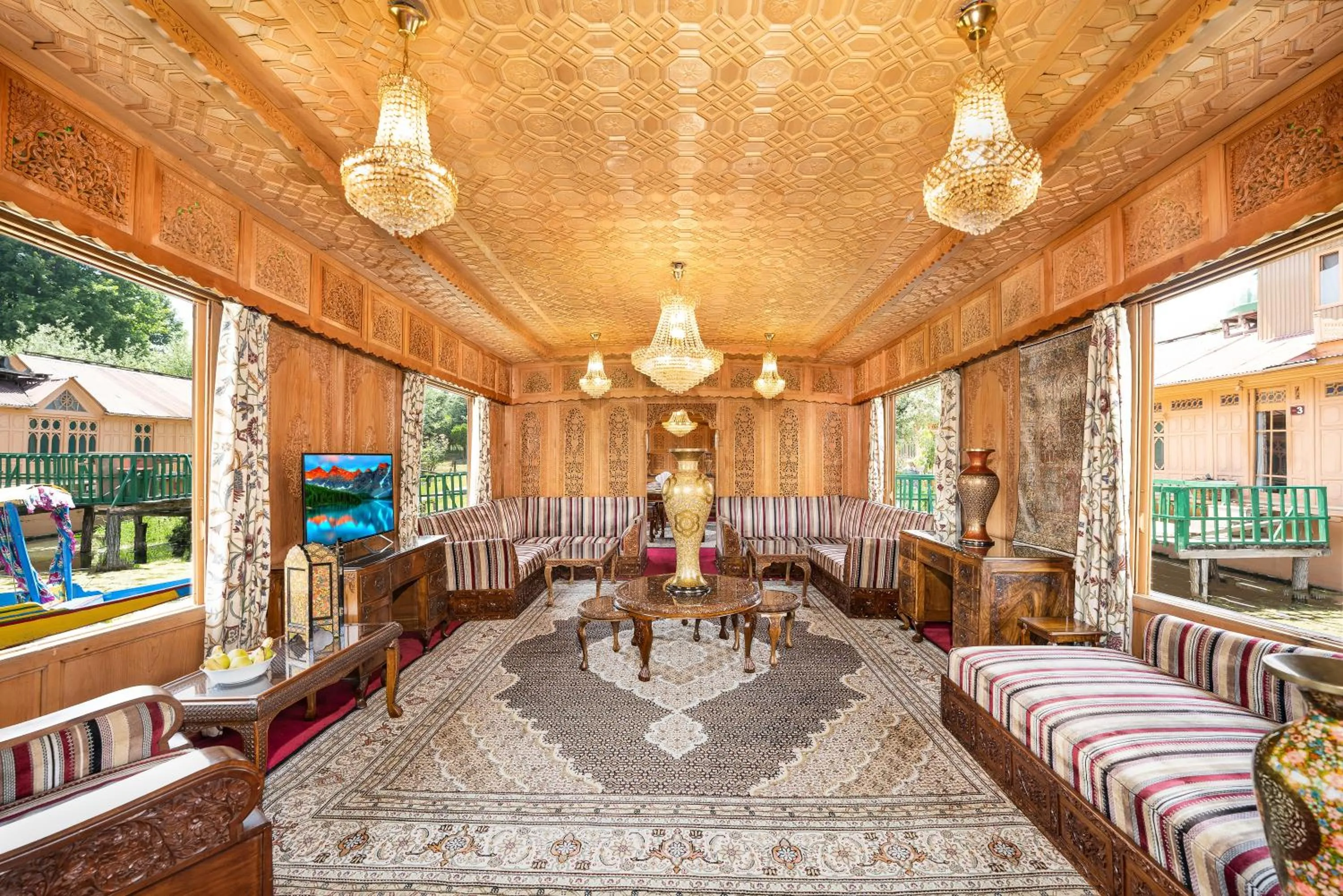 Living room in WelcomHeritage Gurkha Houseboats