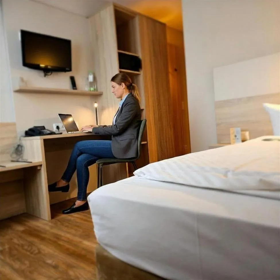Bed in Hotel Alpha