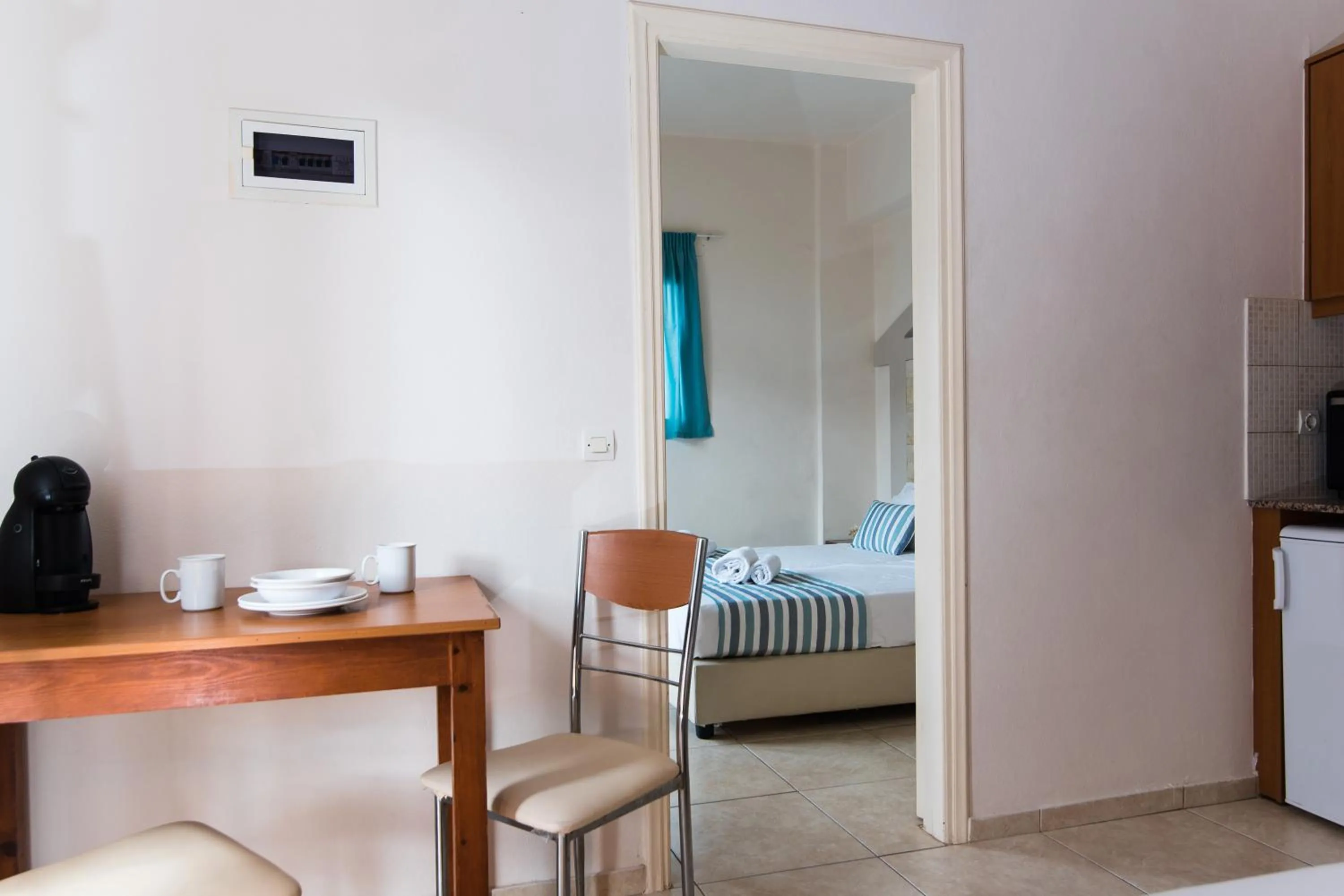 Living room, Bed in Ilios 1 Central