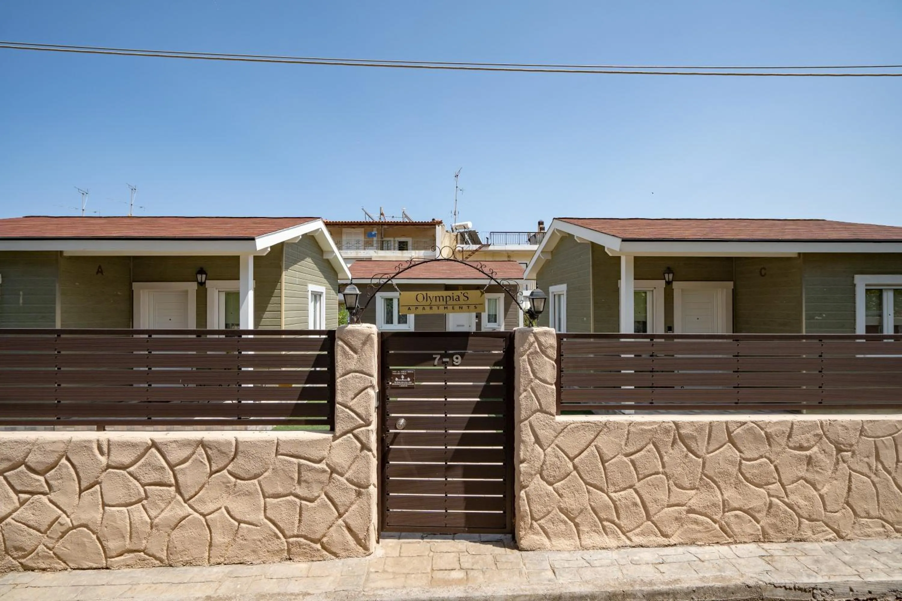 Property building in Olympia's Apartments by Traser