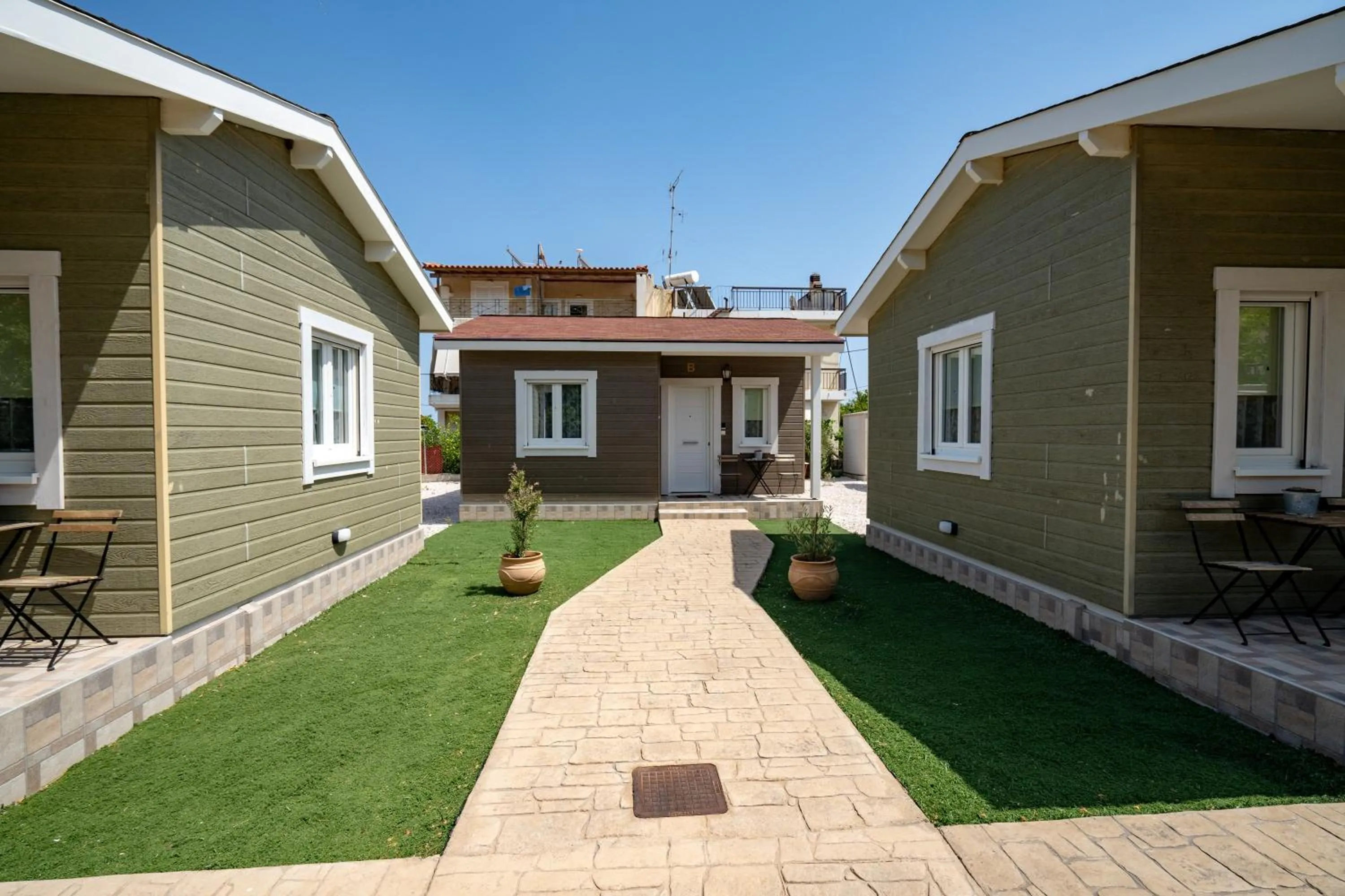 Property building in Olympia's Apartments by Traser