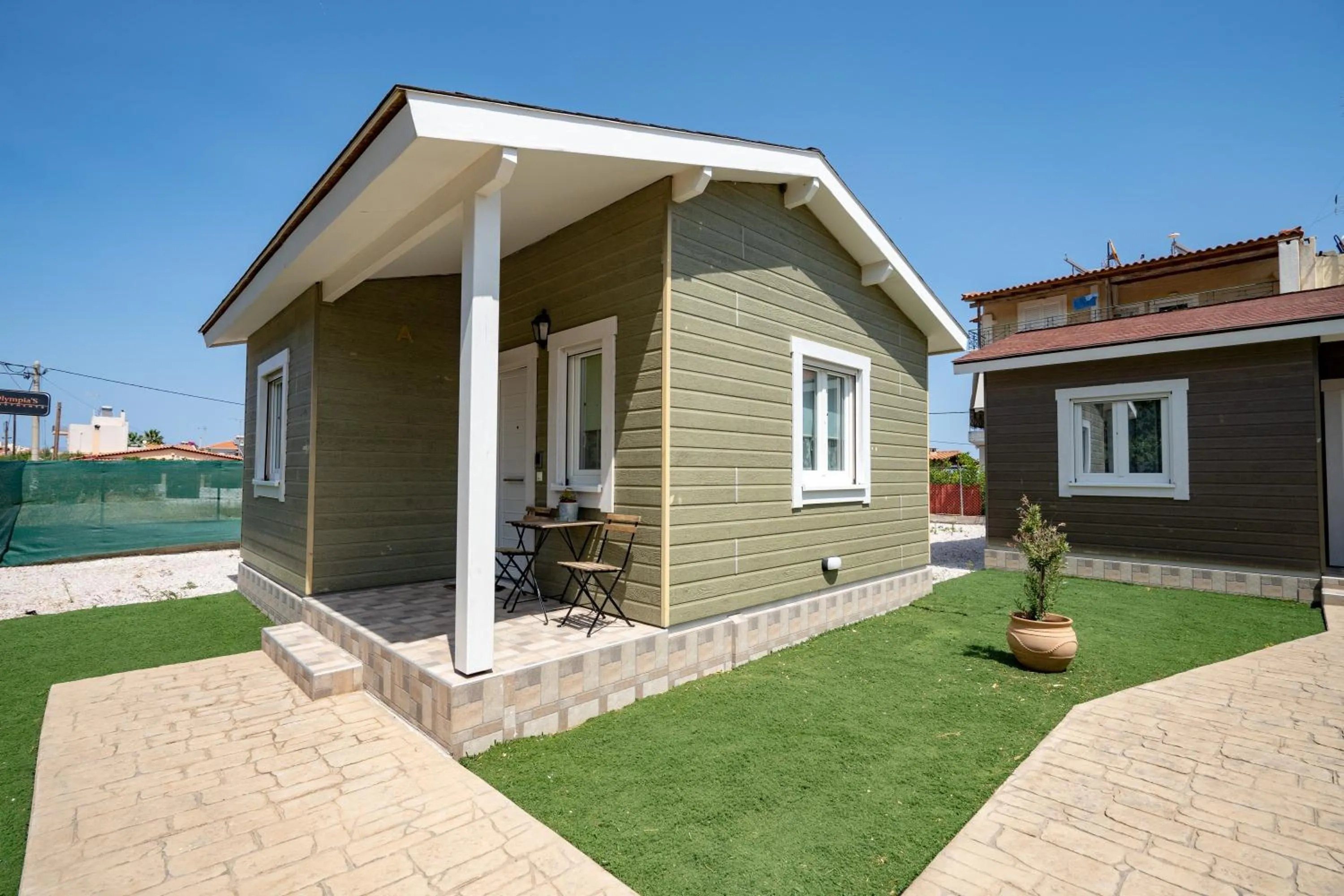 Property building in Olympia's Apartments by Traser