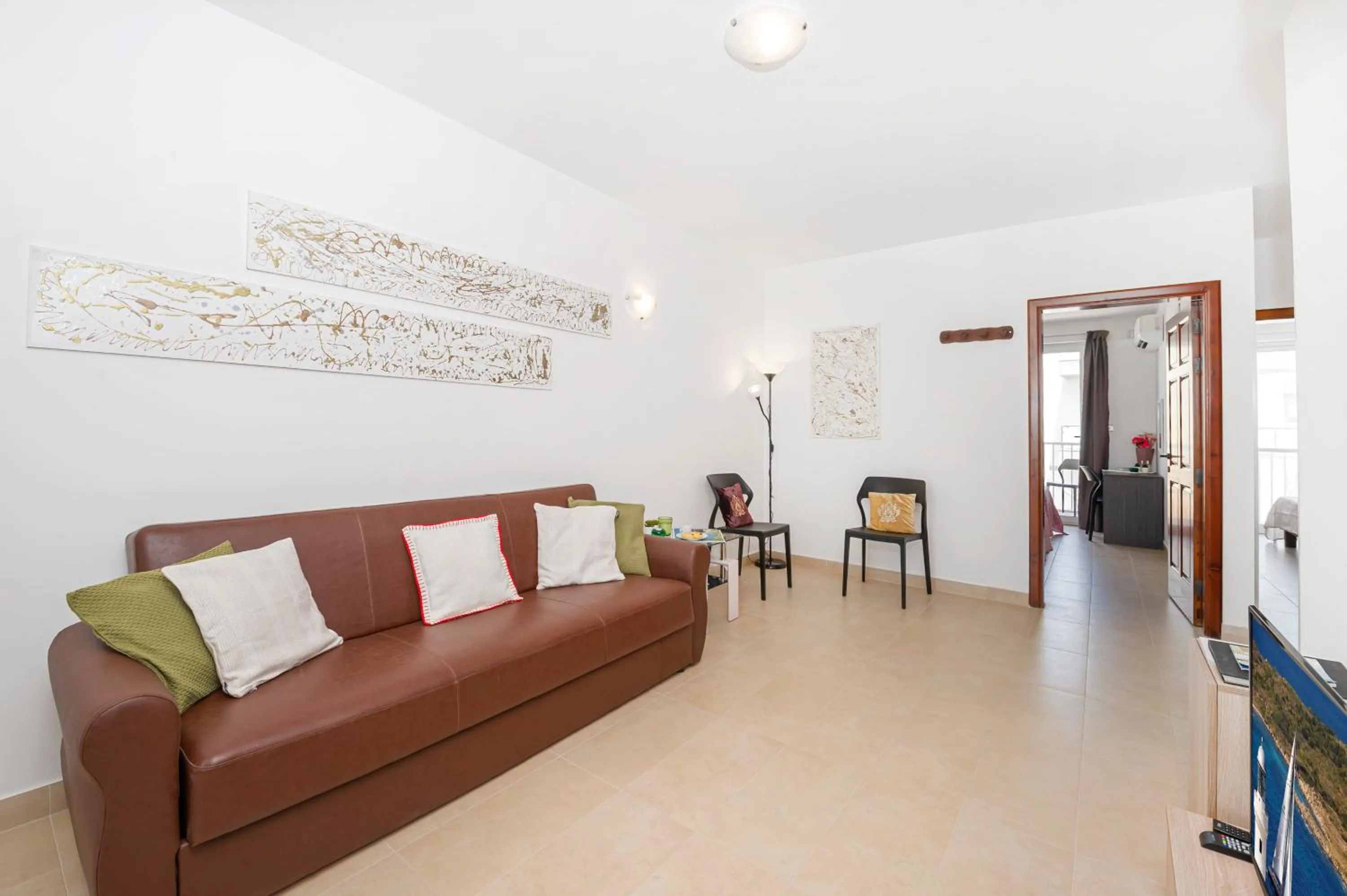 Property building in Summer Breeze Apartment with panoramic terrace - by Getawaysmalta