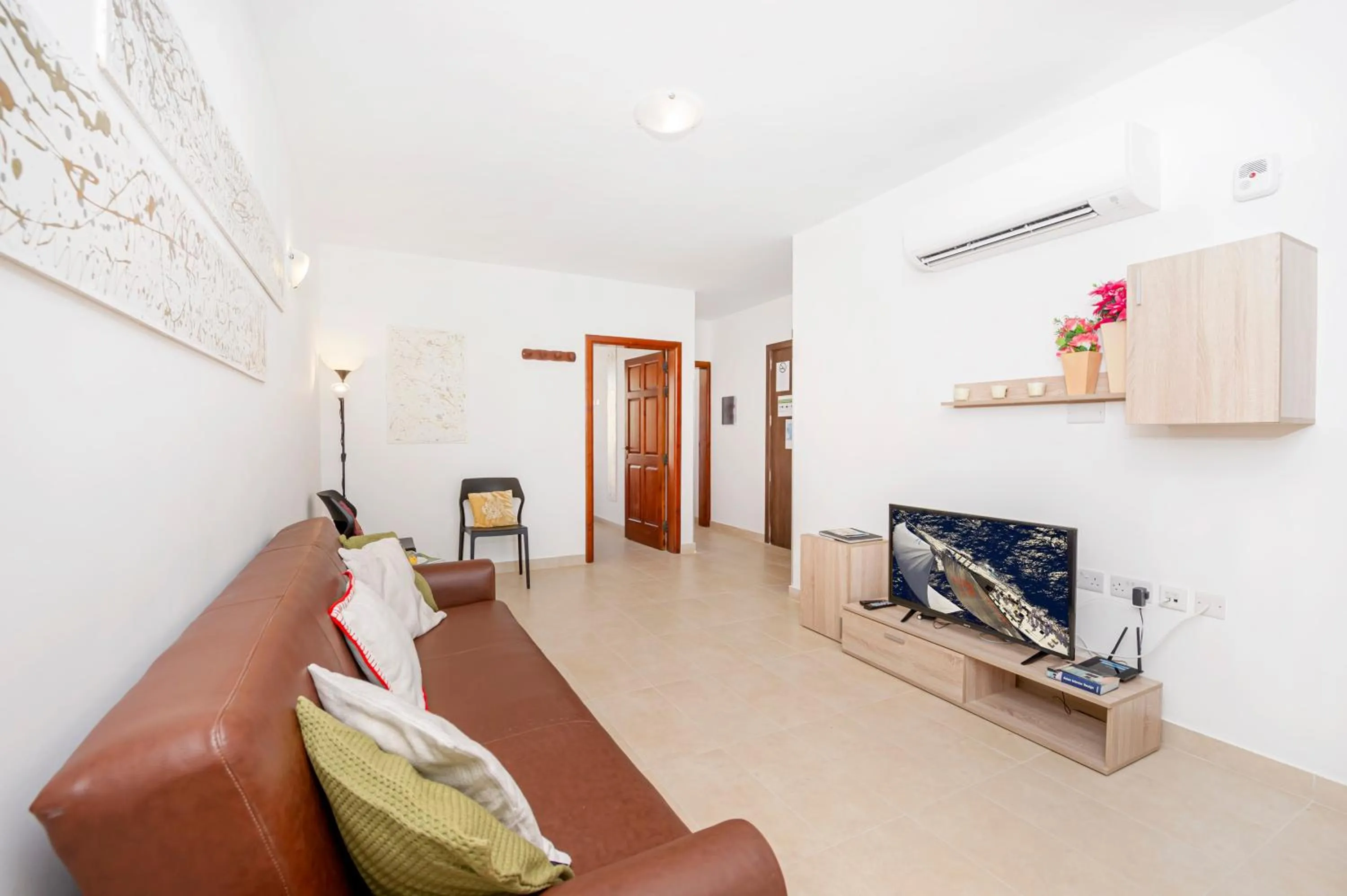 Living room in Summer Breeze Apartment with panoramic terrace - by Getawaysmalta