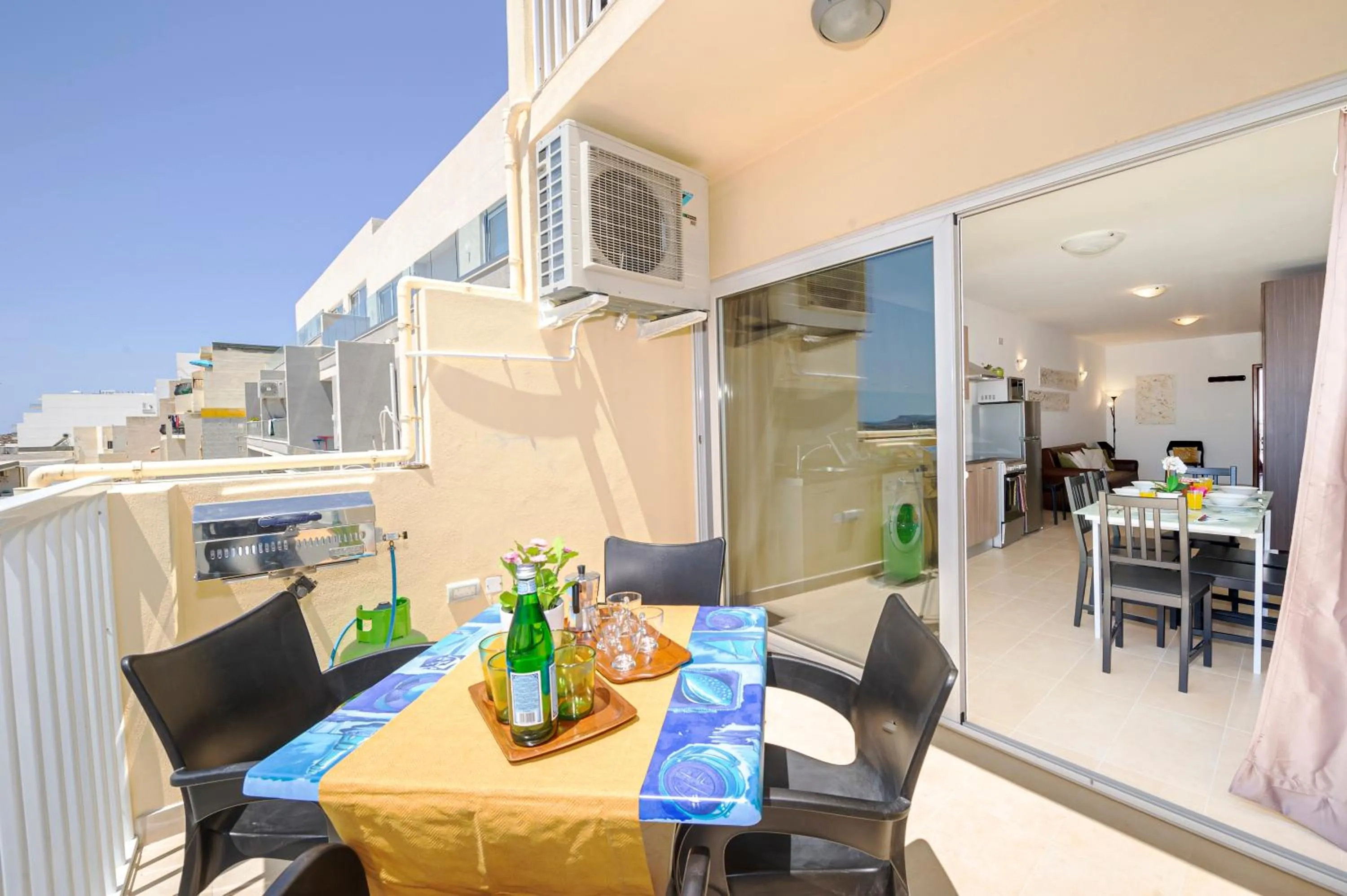 Property building in Summer Breeze Apartment with panoramic terrace - by Getawaysmalta
