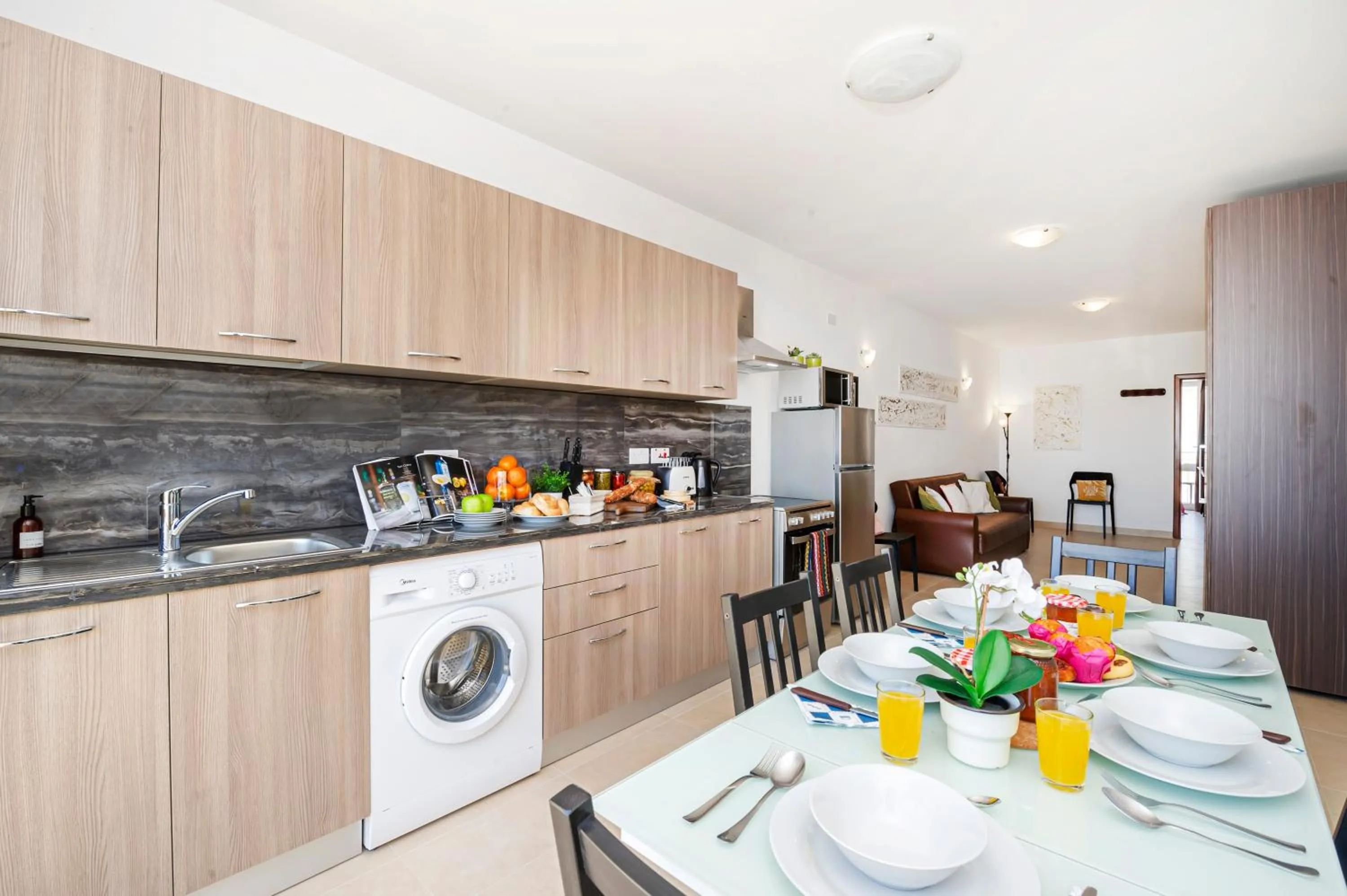 Property building in Summer Breeze Apartment with panoramic terrace - by Getawaysmalta