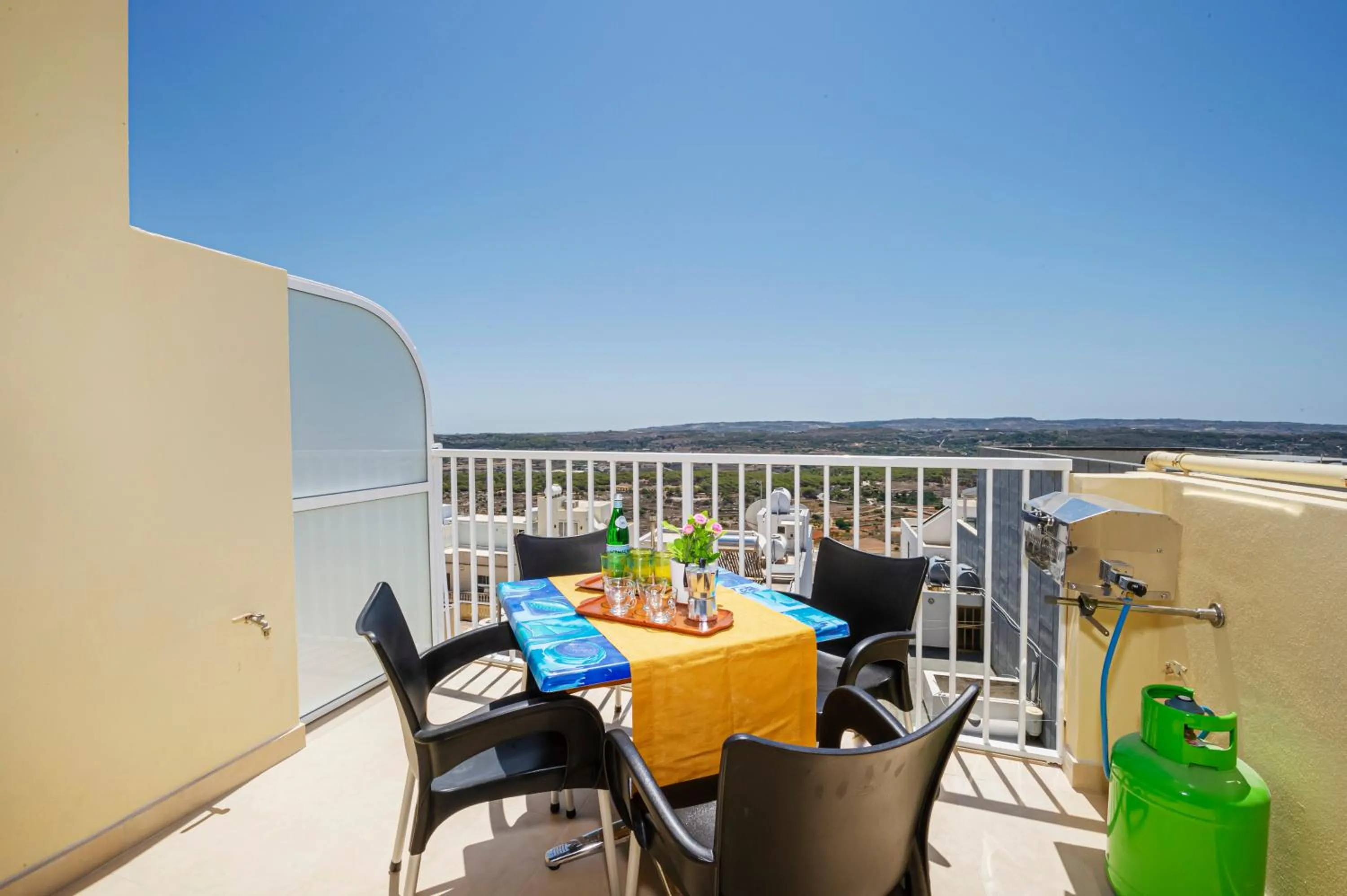 Property building in Summer Breeze Apartment with panoramic terrace - by Getawaysmalta
