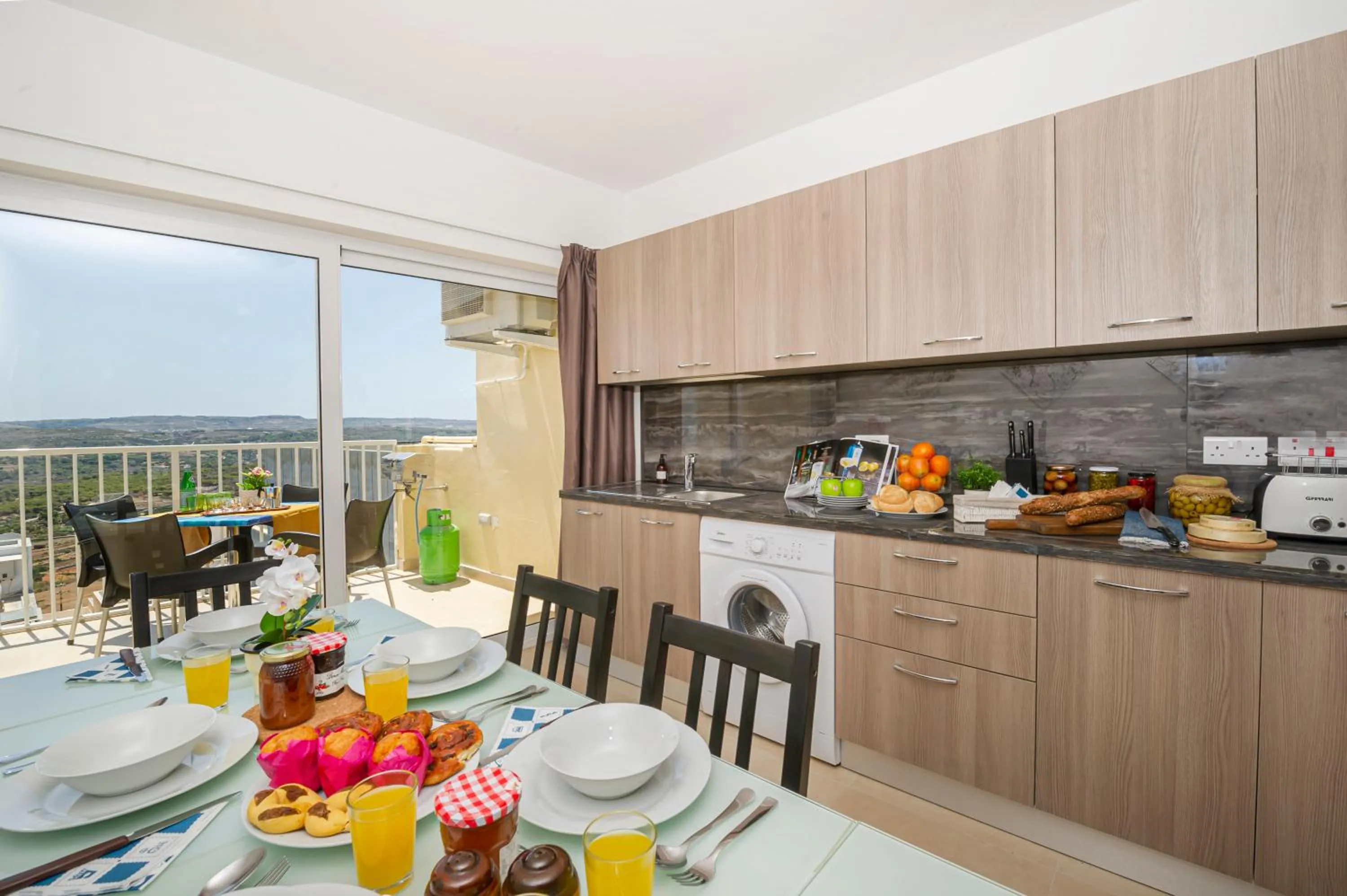 Property building in Summer Breeze Apartment with panoramic terrace - by Getawaysmalta