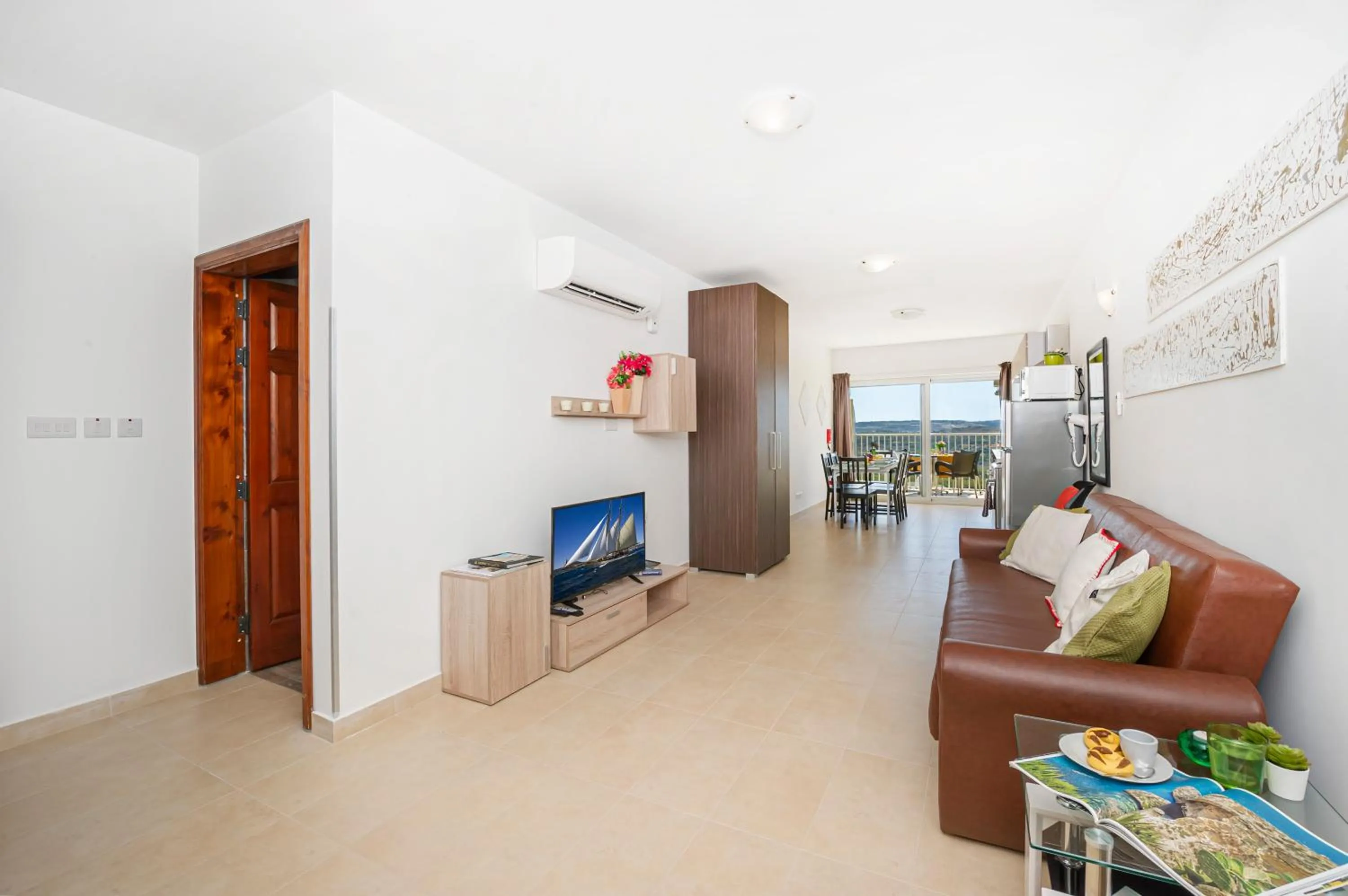 Property building in Summer Breeze Apartment with panoramic terrace - by Getawaysmalta