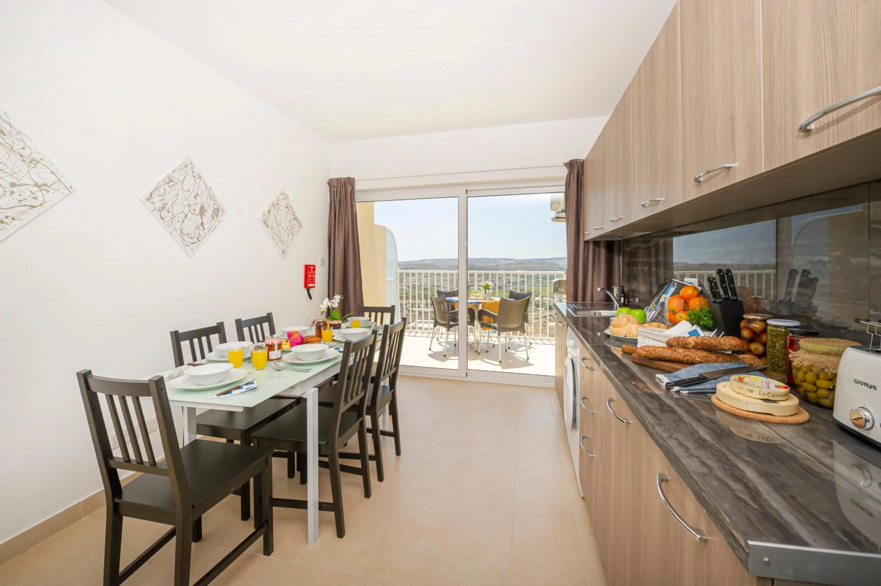 Property building in Summer Breeze Apartment with panoramic terrace - by Getawaysmalta