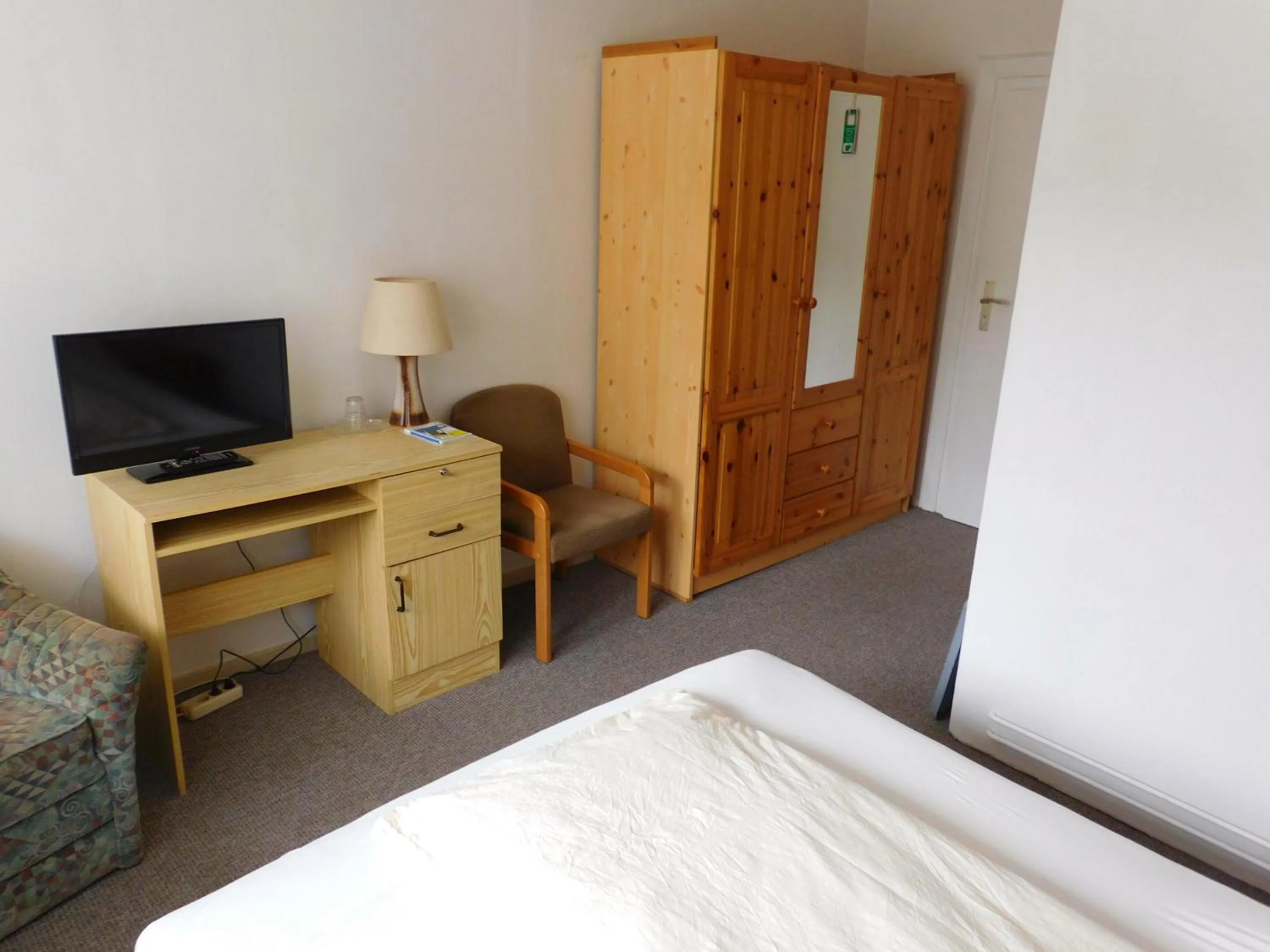 Photo of the whole room, Bed in Hotel Pension am Kurmittelhaus