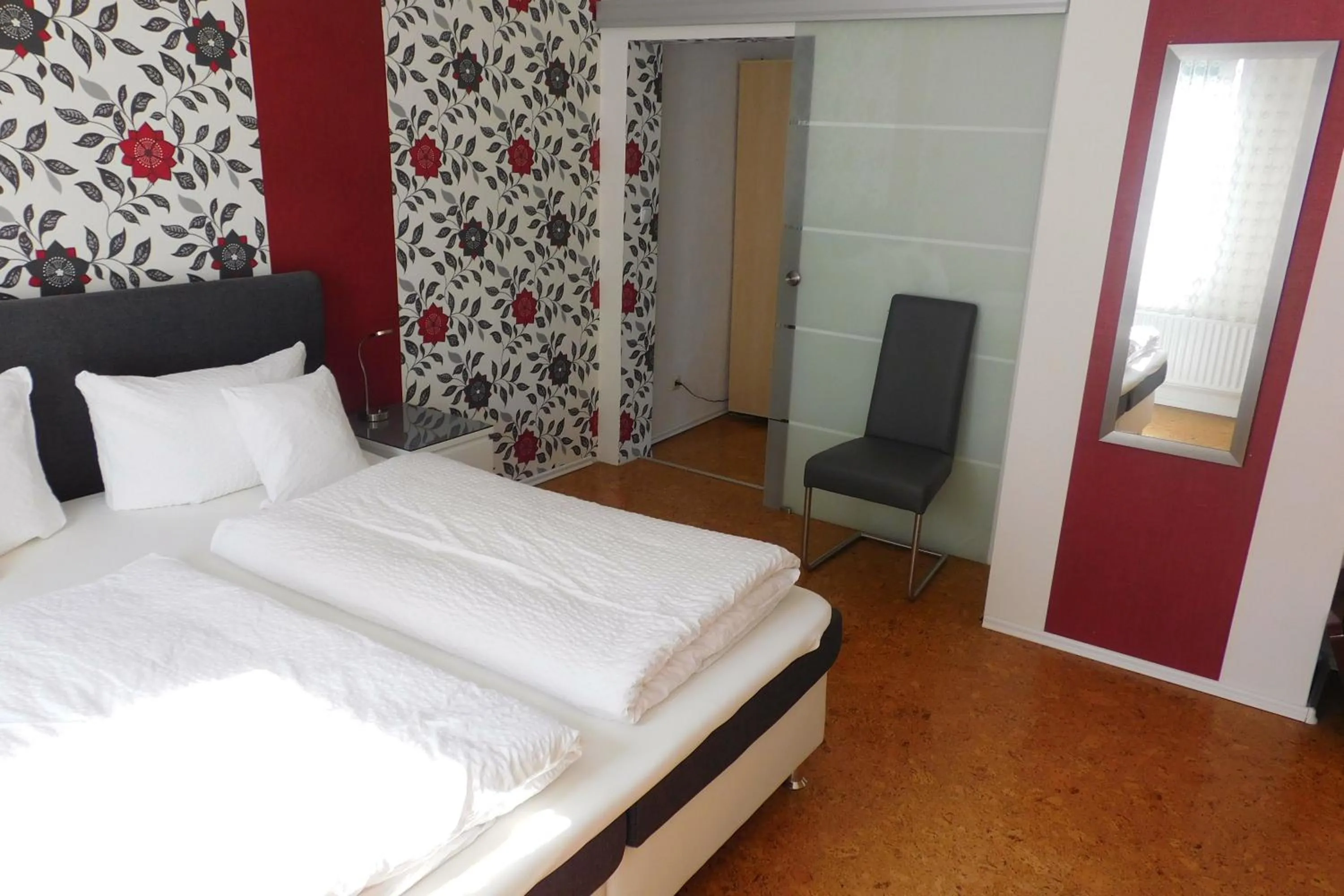 Photo of the whole room, Bed in Hotel Pension am Kurmittelhaus