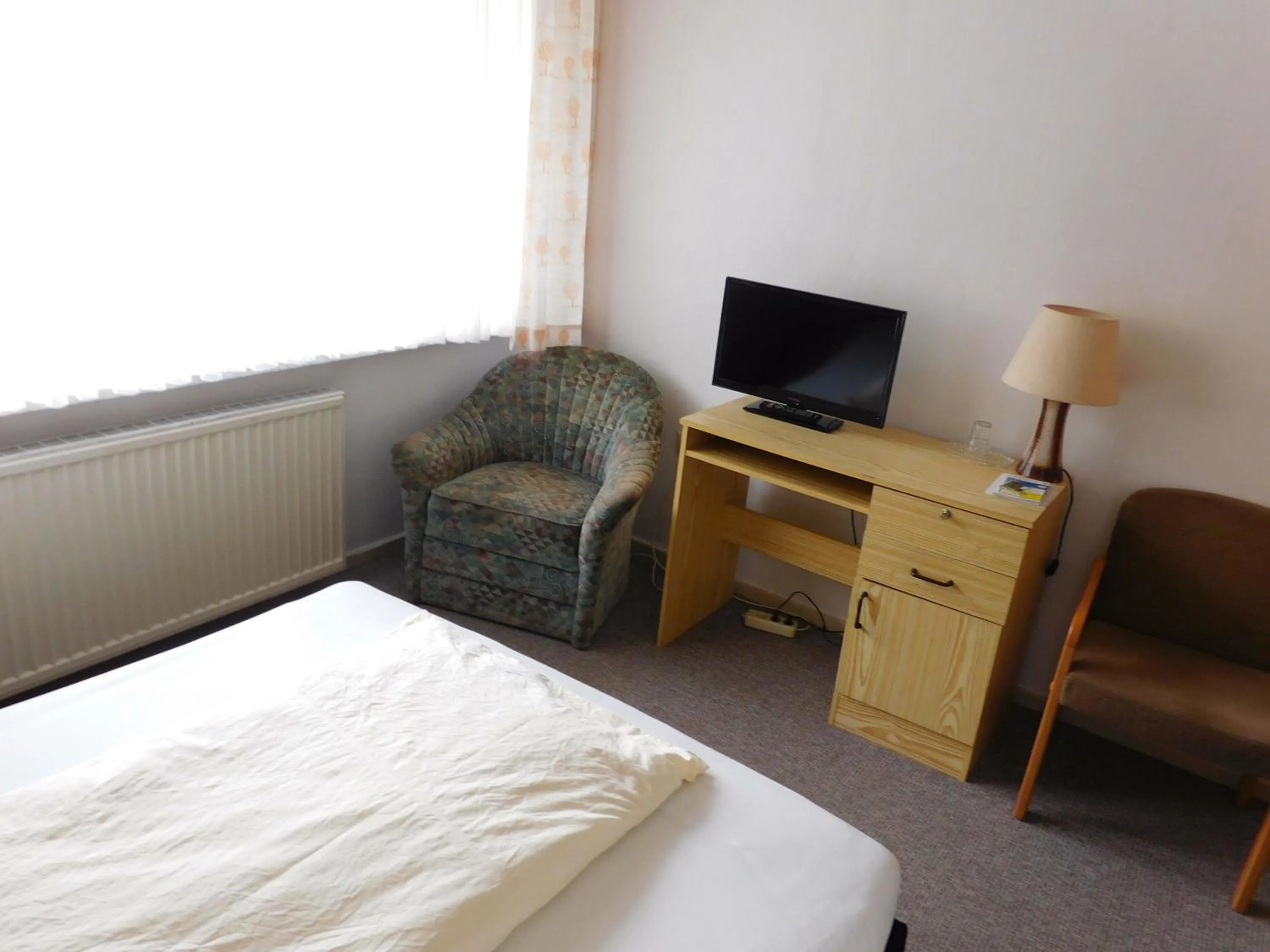 Photo of the whole room, Bed in Hotel Pension am Kurmittelhaus