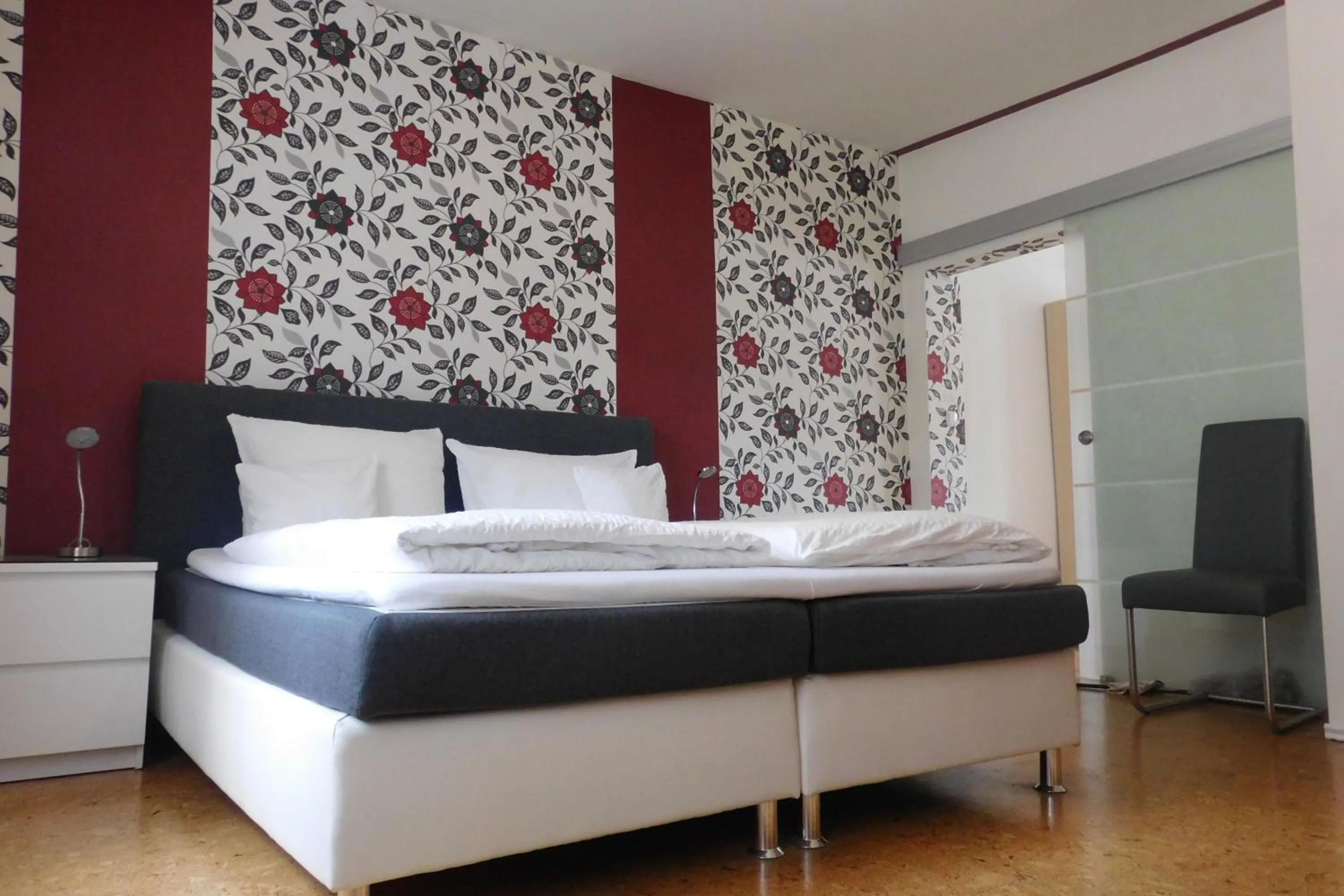 Photo of the whole room, Bed in Hotel Pension am Kurmittelhaus