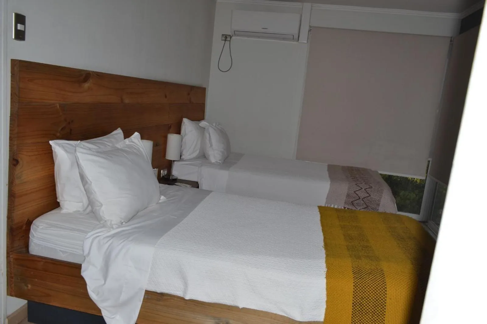 Bed in De Triana Hotel