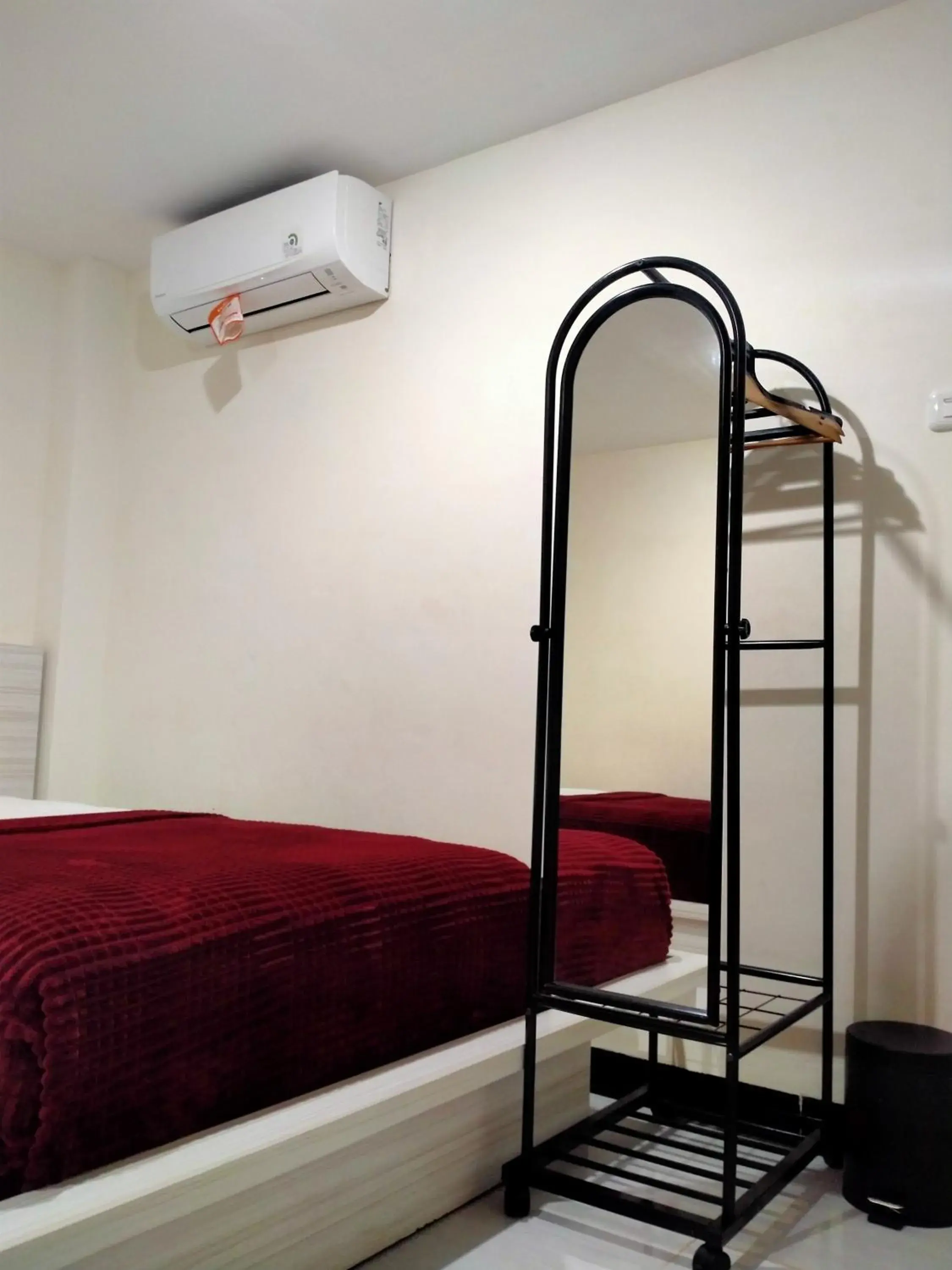 Bed in GRANADA INN PALU Bed in GRANADA INN PALU