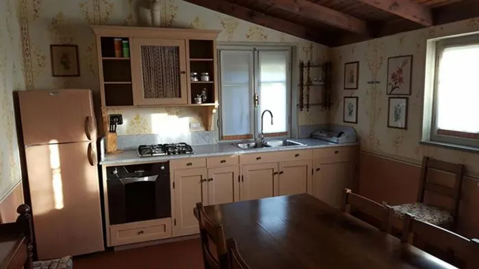 Kitchen or kitchenette in Agriturismo La Carreccia