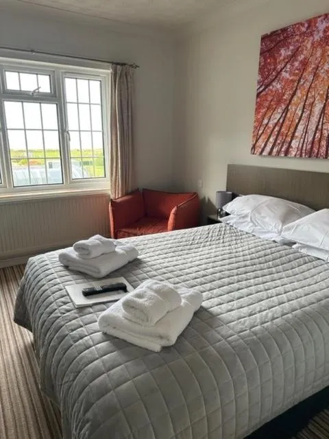 Bed in The Dormy House Hotel