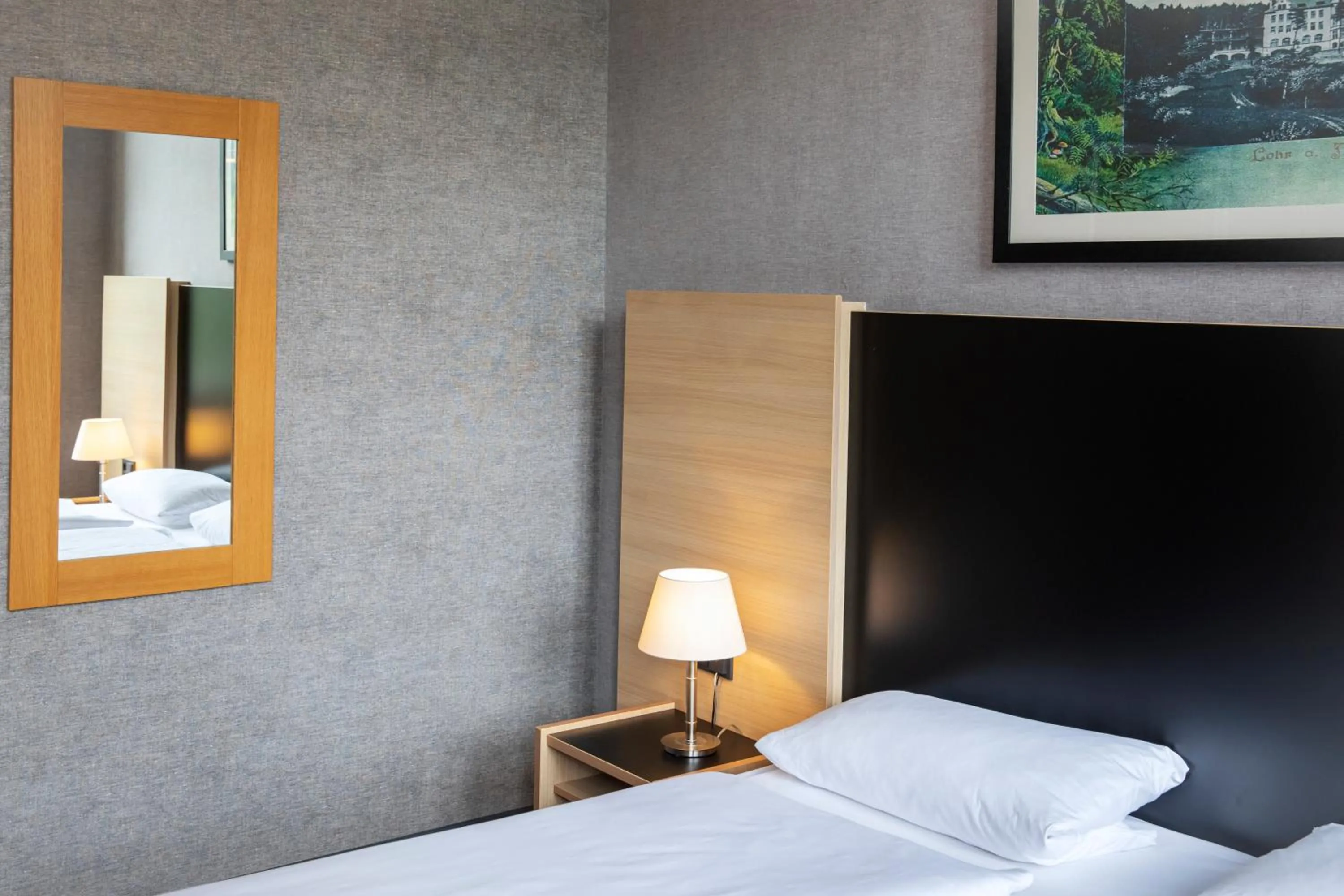 Photo of the whole room, Bed in Michel Hotel Franziskushöhe Lohr am Main