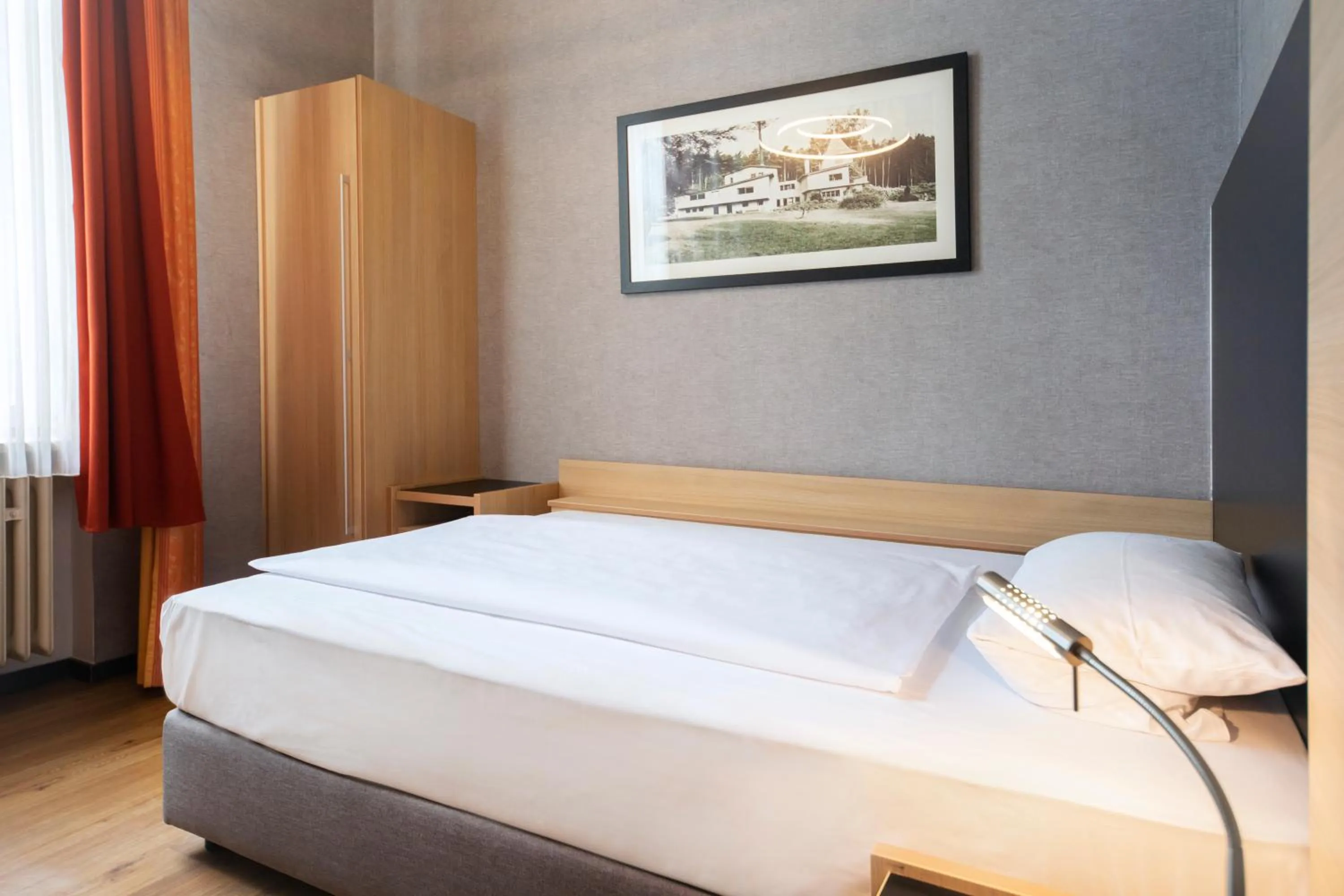 Photo of the whole room, Bed in Michel Hotel Franziskushöhe Lohr am Main