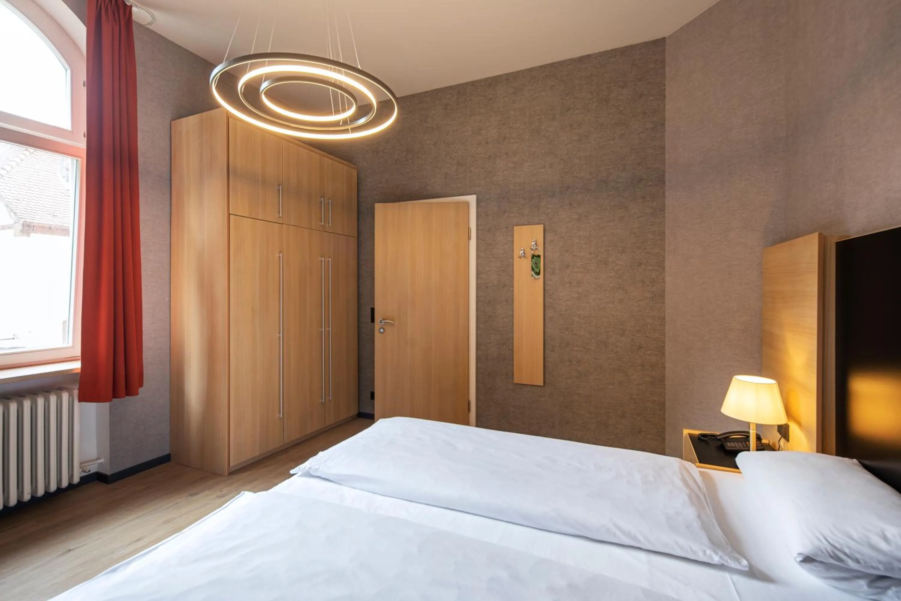 Photo of the whole room, Bed in Michel Hotel Franziskushöhe Lohr am Main