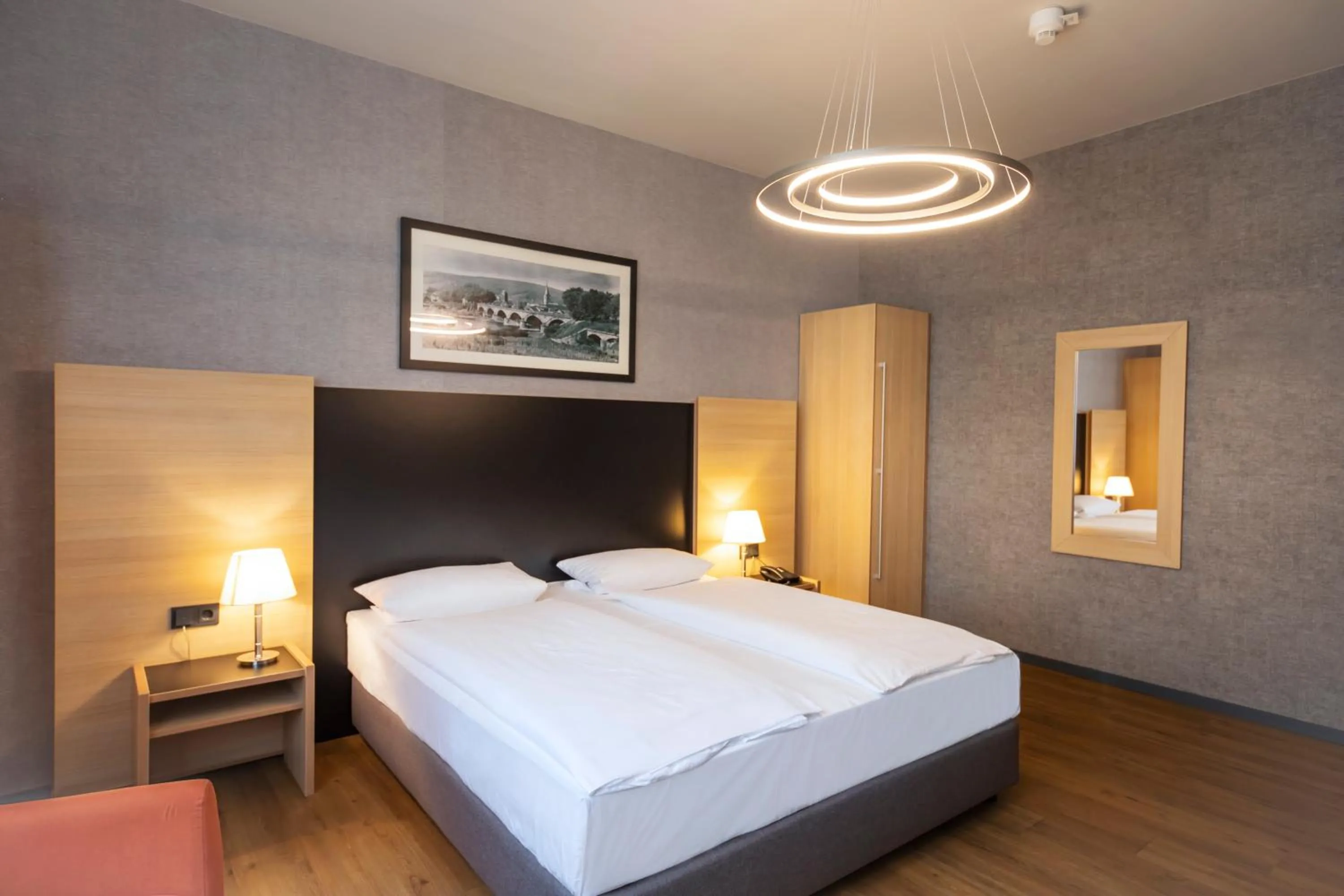 Photo of the whole room, Bed in Michel Hotel Franziskushöhe Lohr am Main