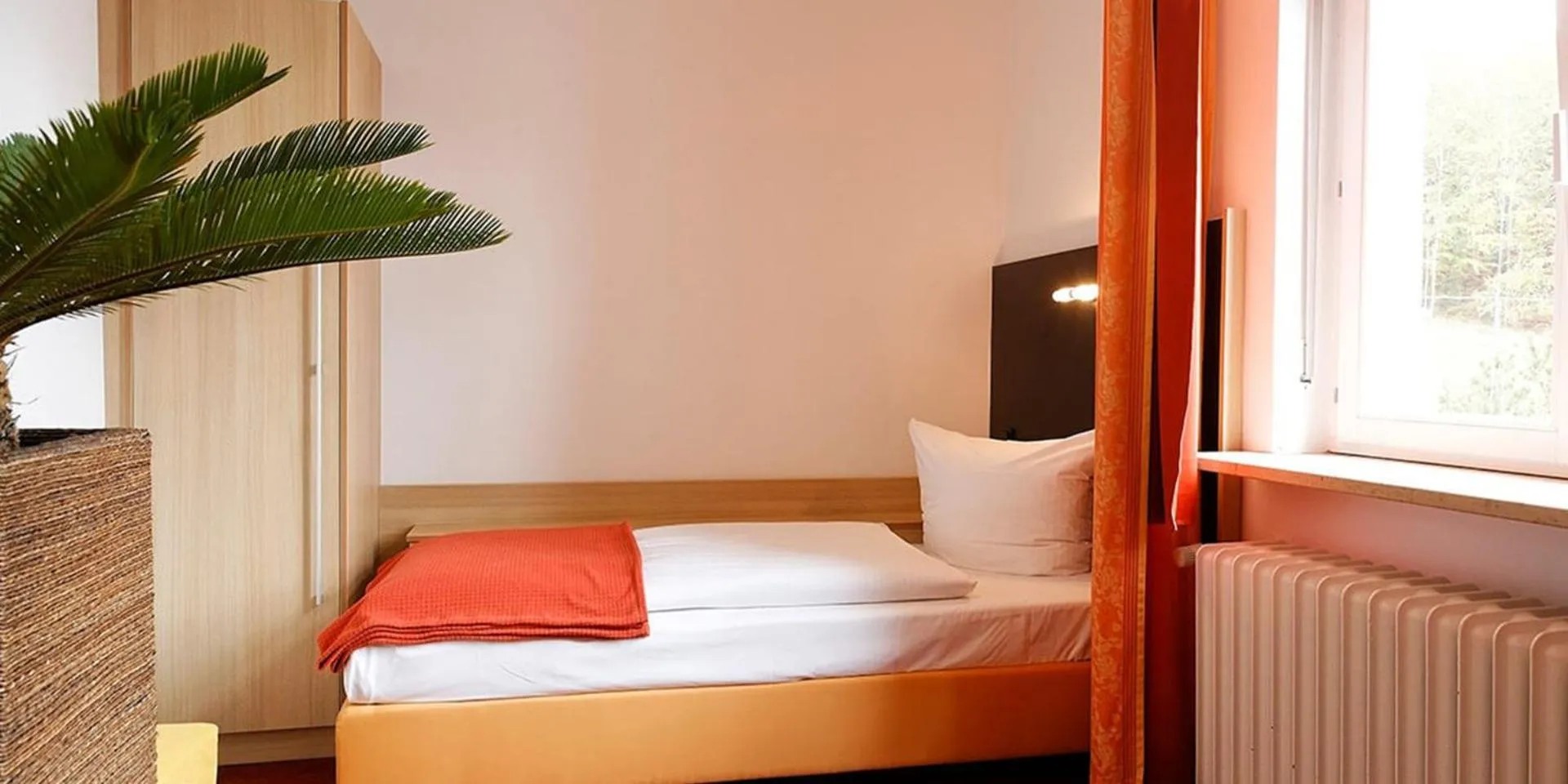 Photo of the whole room, Bed in Michel Hotel Franziskushöhe Lohr am Main