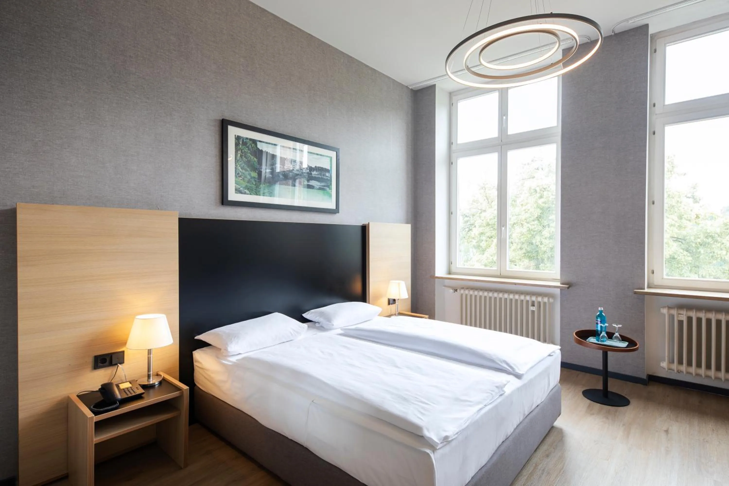 Photo of the whole room, Bed in Michel Hotel Franziskushöhe Lohr am Main