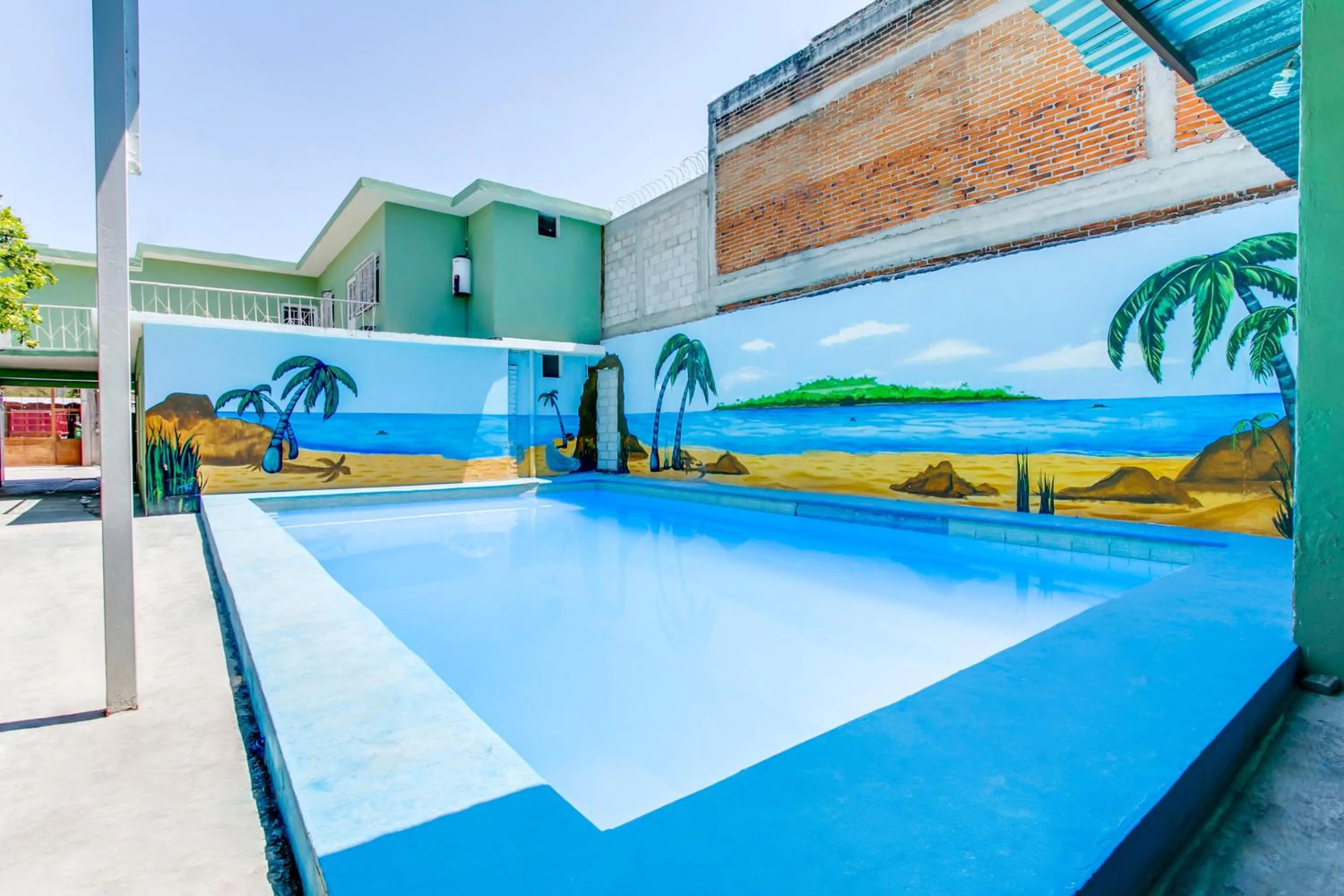 Swimming pool in OYO Hotel Margarita