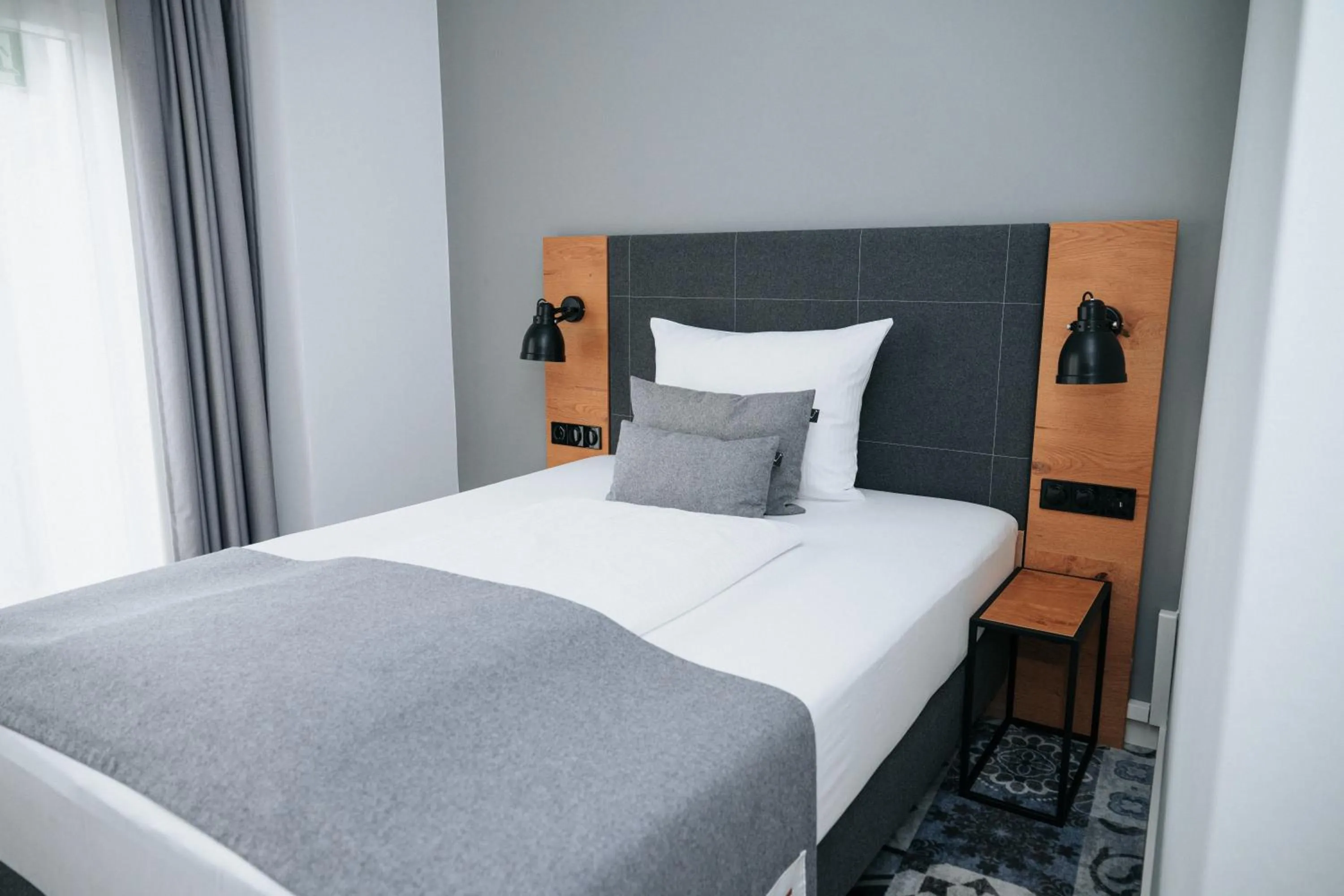 Photo of the whole room, Bed in Coffee Fellows Hotel Trier