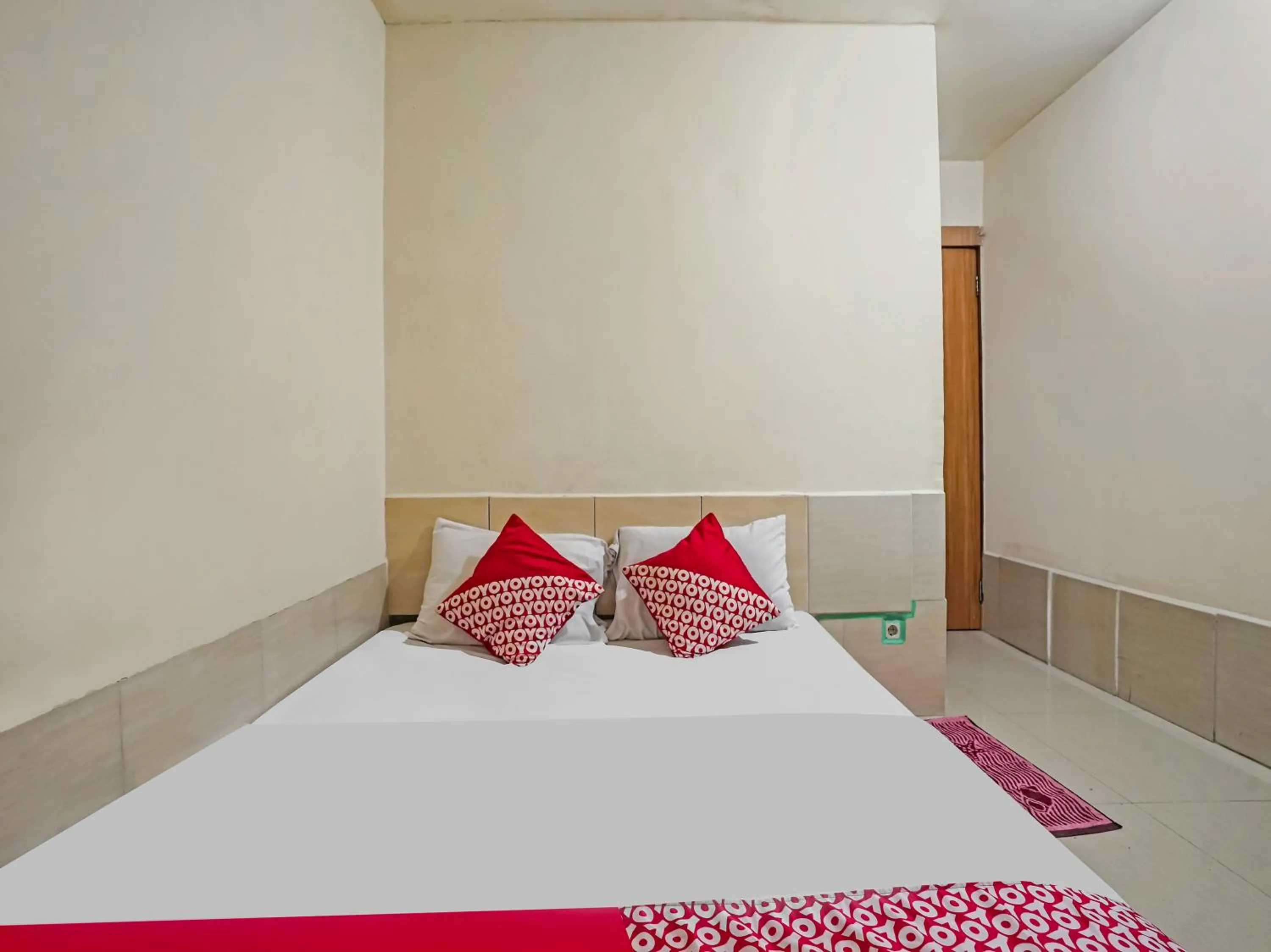 Bedroom in OYO 90158 Hotel Lendosis Perintis Kemerdekaan