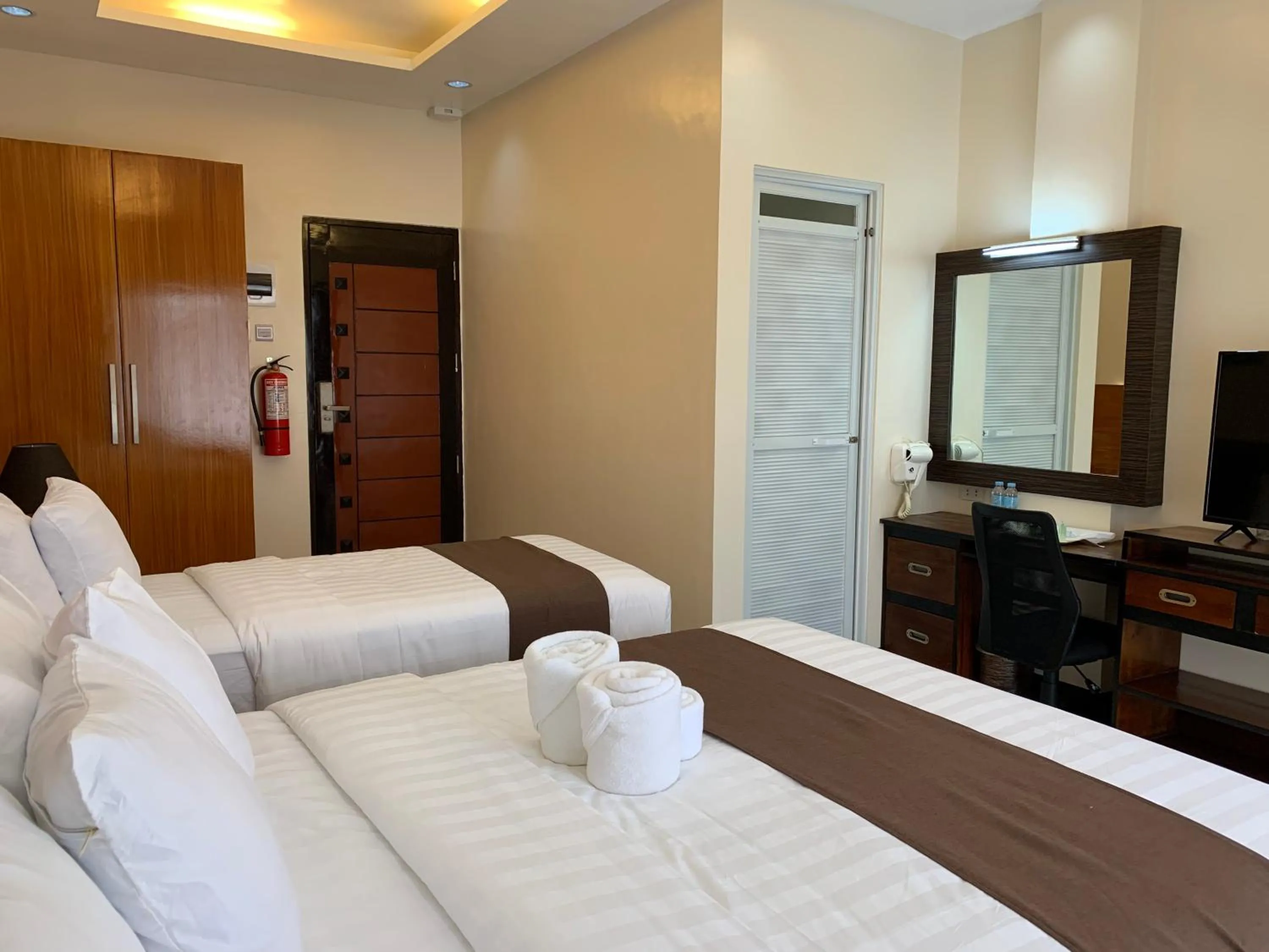 Bed in Villa MJ Maristela Beach Resort